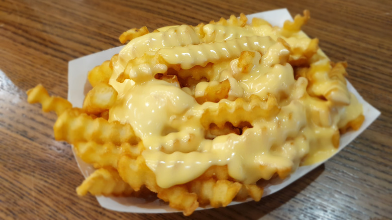 Order Cheese Fries food online from Six Corners Café store, North Bergen on bringmethat.com