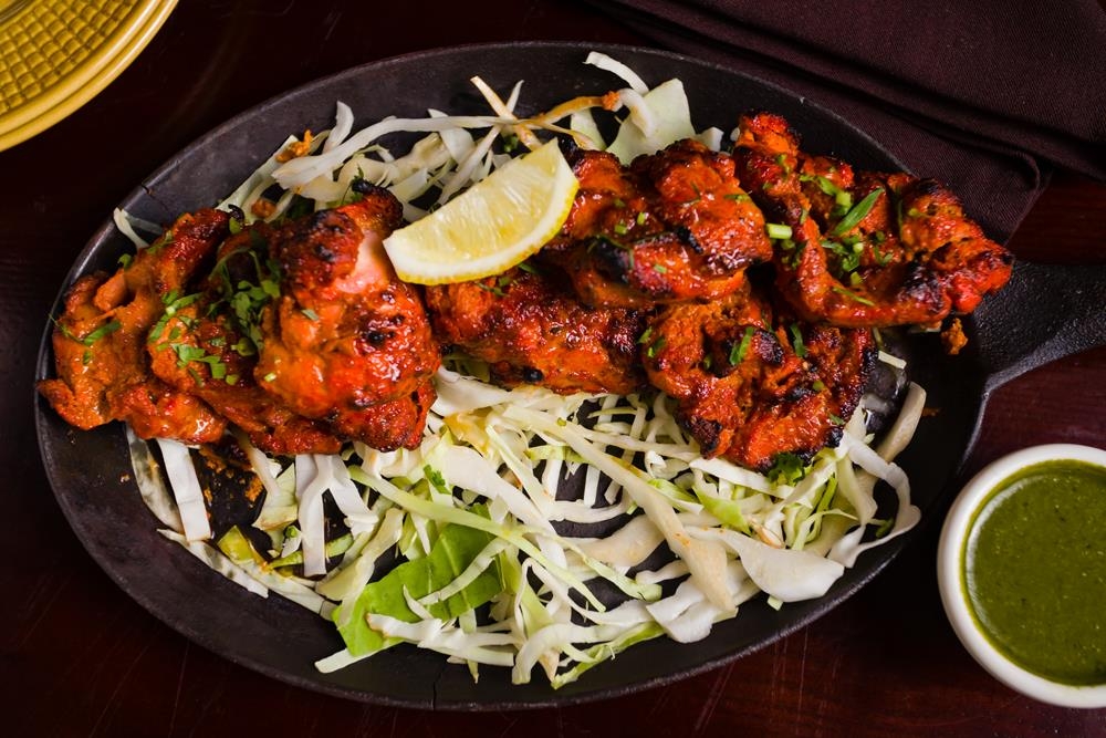 Order Murgh Tikka food online from Dhaba indian cuisine store, New York on bringmethat.com