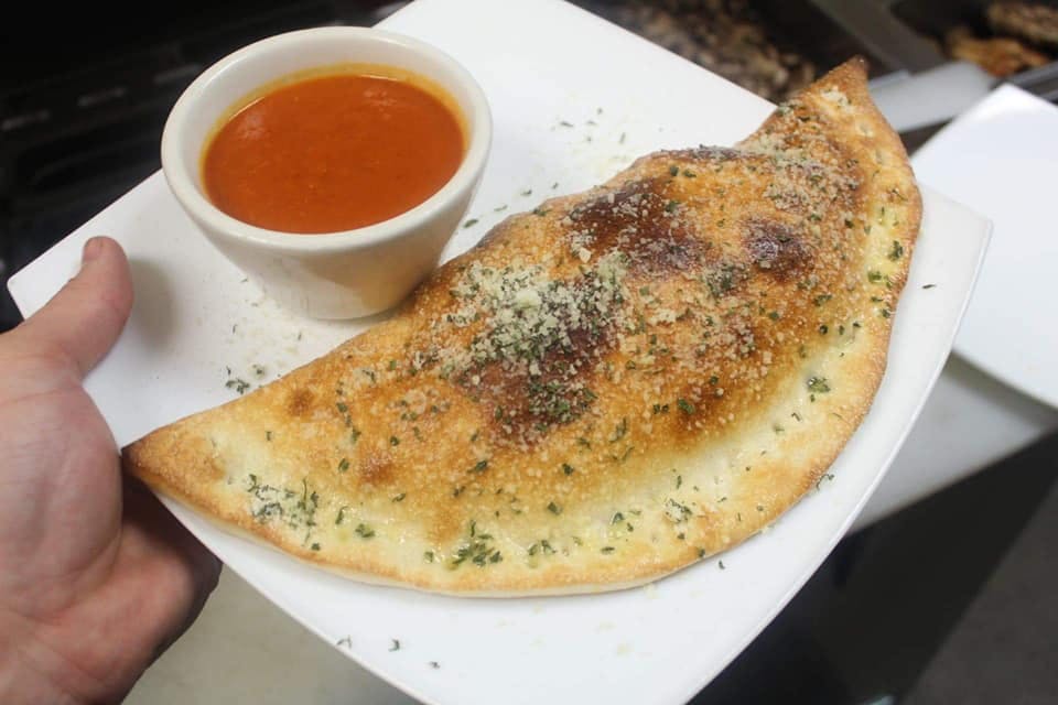 Order Calzone - Calzone food online from Vito Italian Restaurant store, Berryville on bringmethat.com