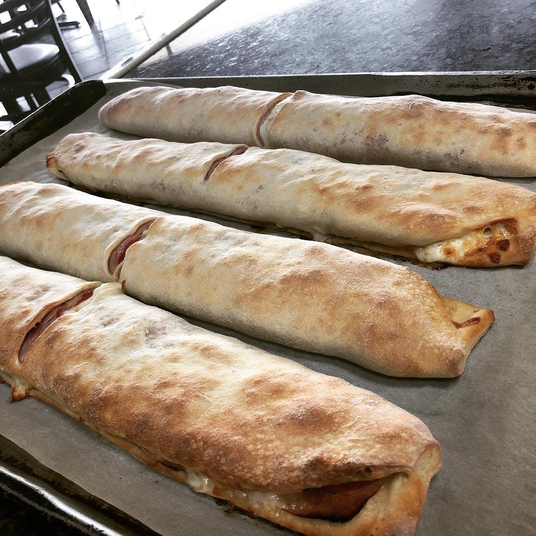 Order Italian Stromboli - Small food online from Romano Pizza store, Somers Point on bringmethat.com