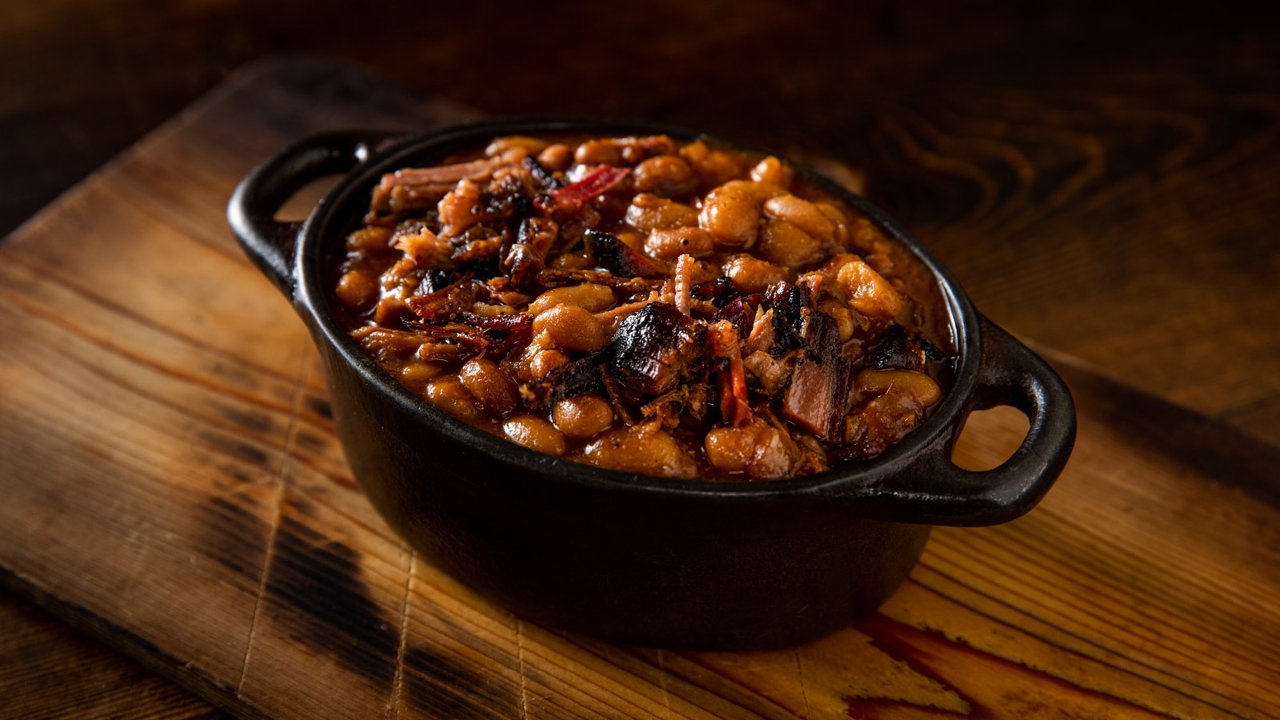Order Burnt End Baked Beans food online from Mighty Quinn's Barbeque store, New York on bringmethat.com