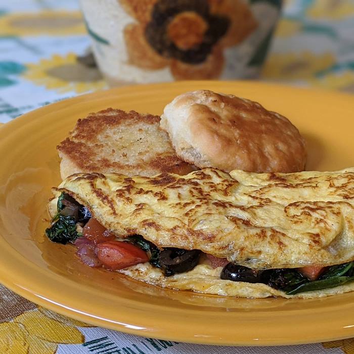 Order Greek Omelet Breakfast food online from Geraldine Kitchen store, Jeffersonville on bringmethat.com