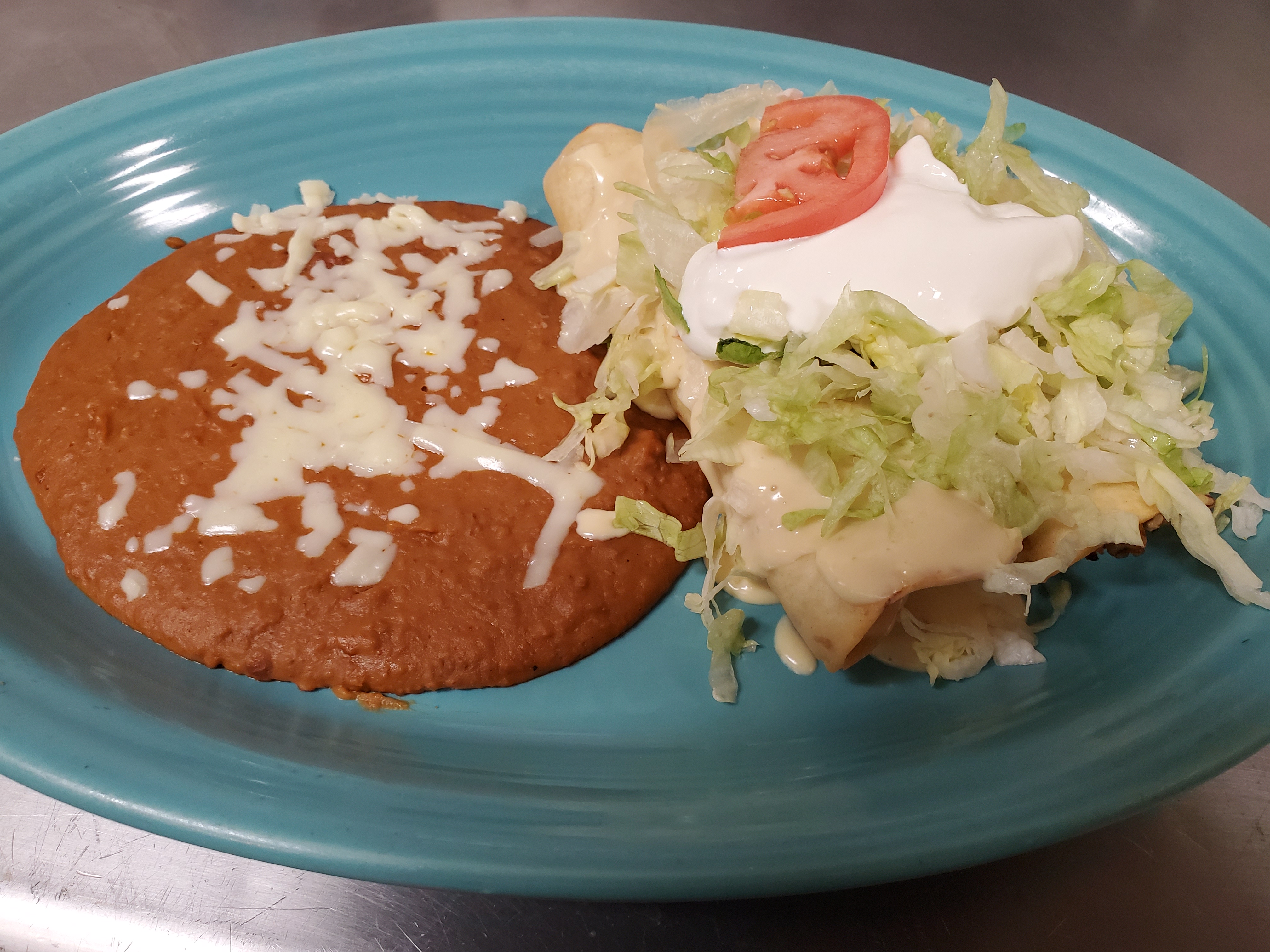 Order Fried Chimichanga food online from Los Gallos Mexican Grill store, Rochester on bringmethat.com