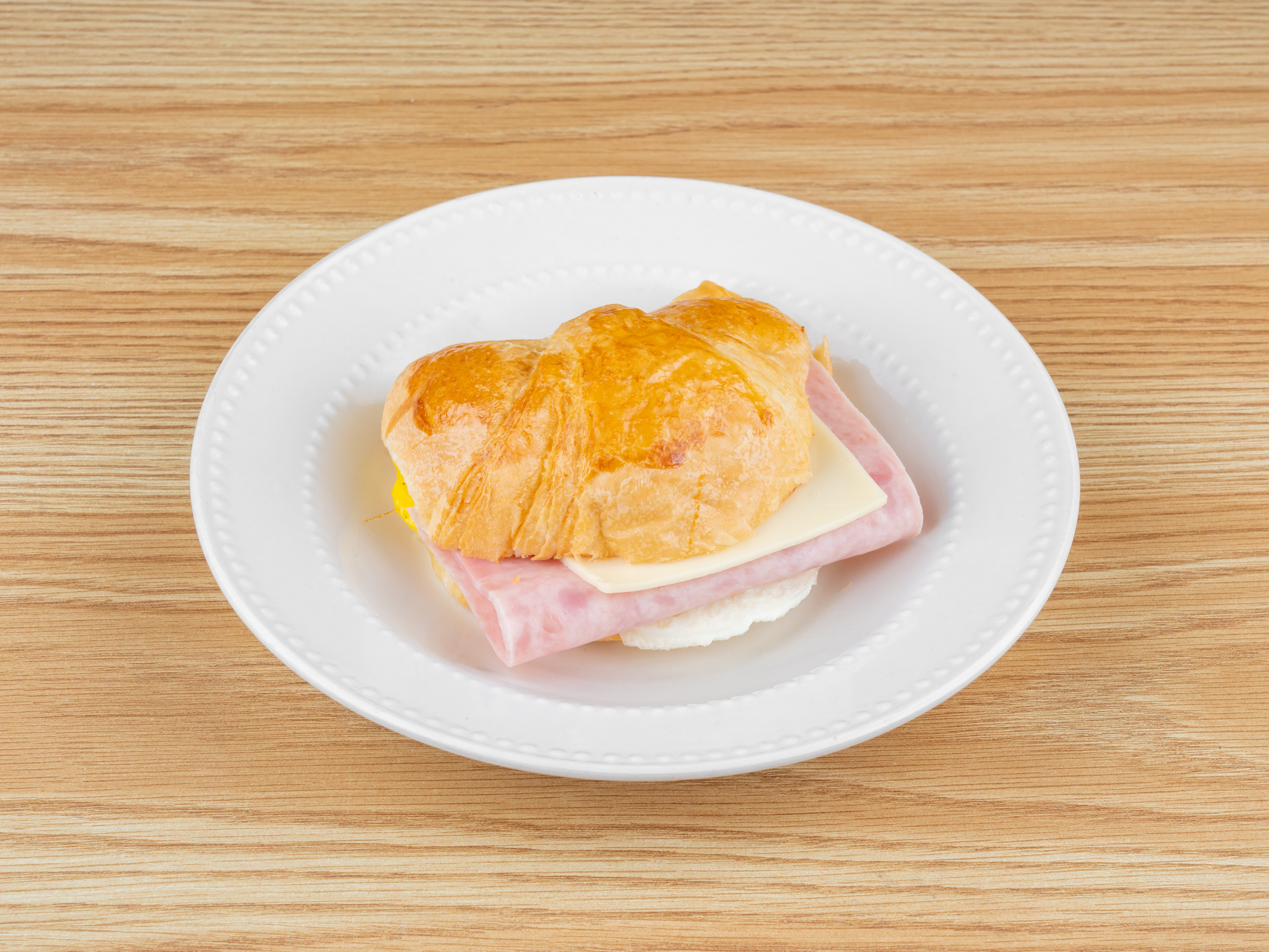 Order Ham, Egg & Cheese Croissant food online from Goodies Donuts store, Rosharon on bringmethat.com