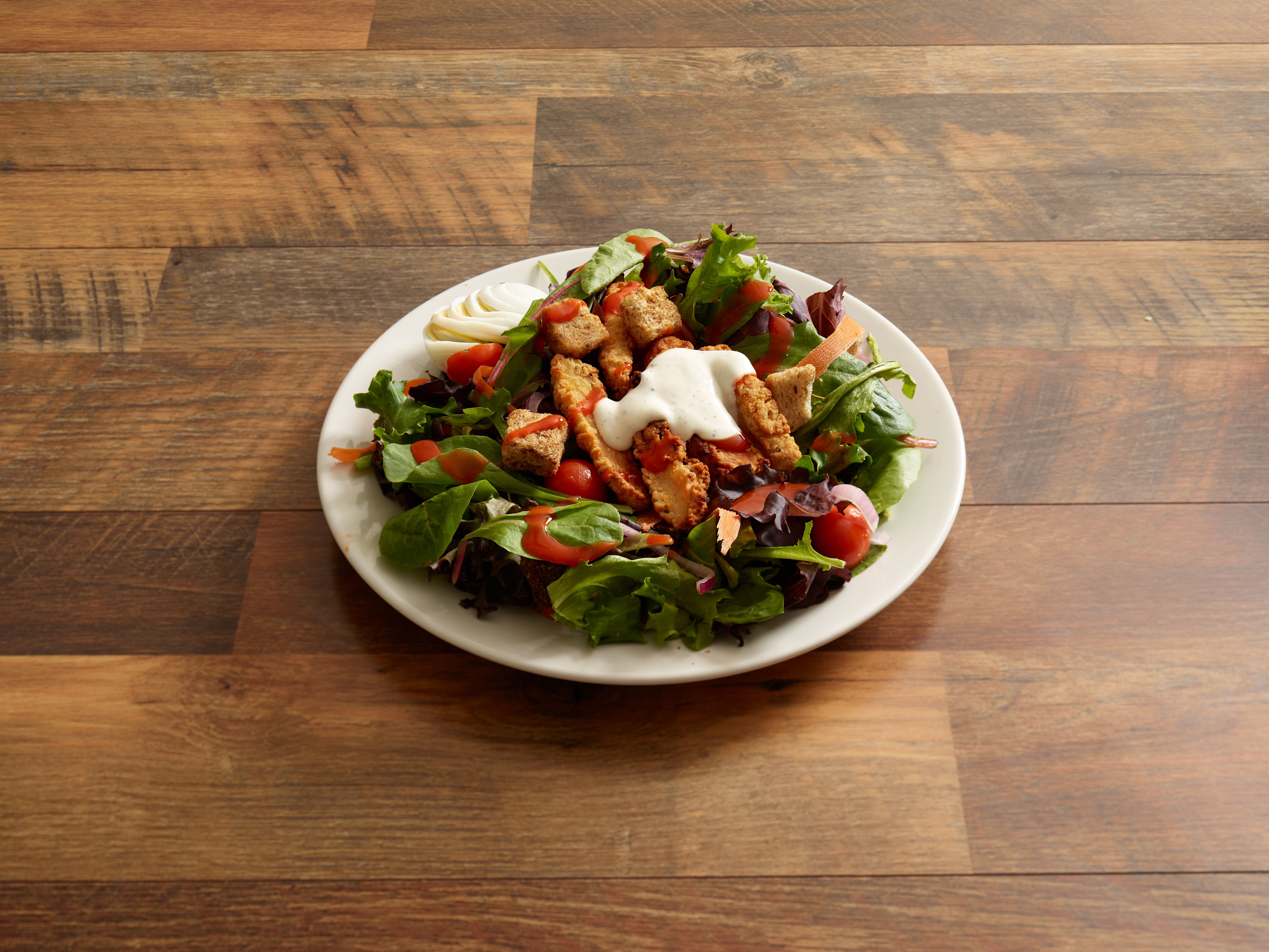 Order Tossed Chicken Salad food online from Trolley Wing Company store, Salt Lake City on bringmethat.com