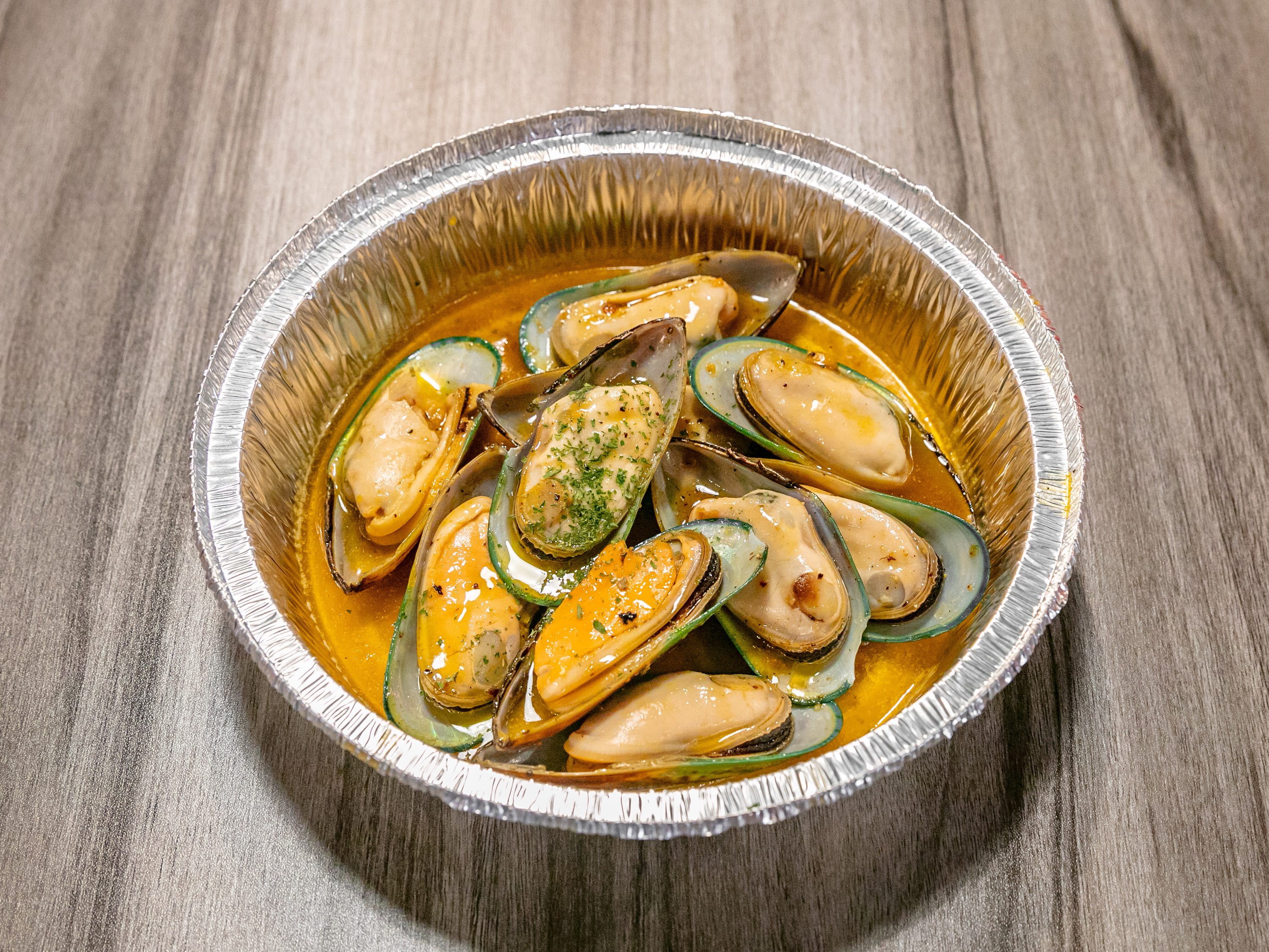 Order 10 Piece Green Mussels food online from Top Crawfish store, Suwanee on bringmethat.com