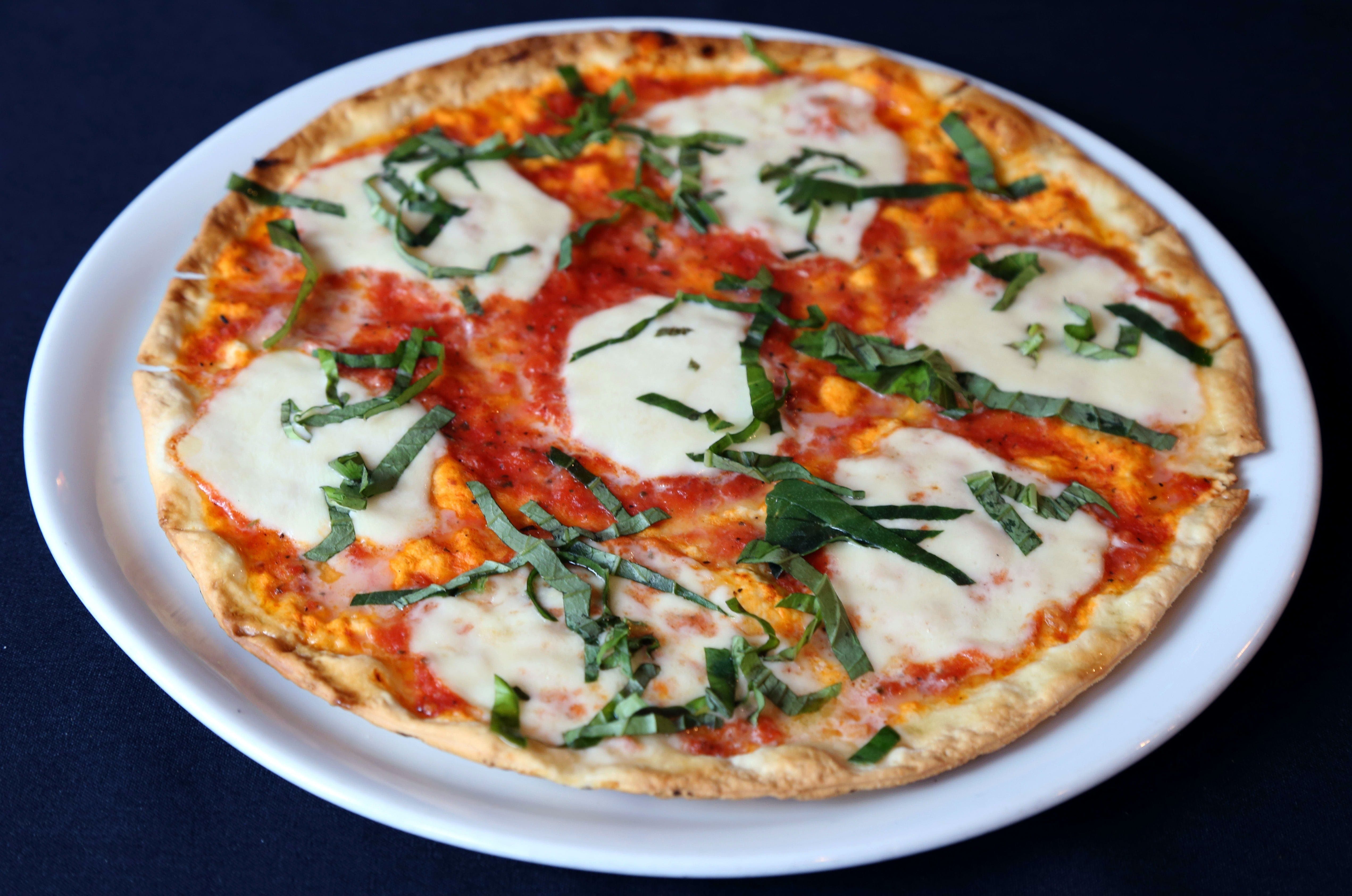Order Margherita Pizza - Medium 12" food online from Bacino's Pizzeria  store, Chicago on bringmethat.com