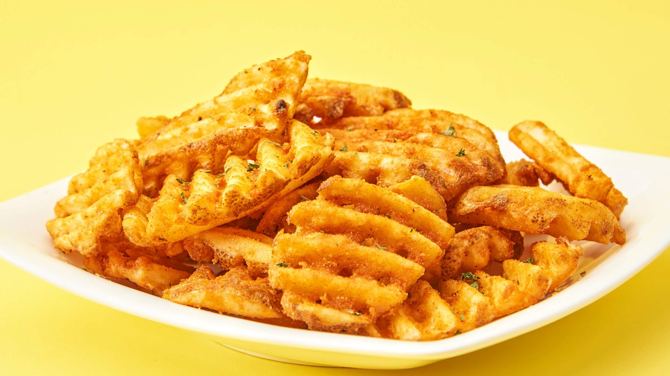Order Large waffle Fries food online from Yummy Bite store, Houston on bringmethat.com
