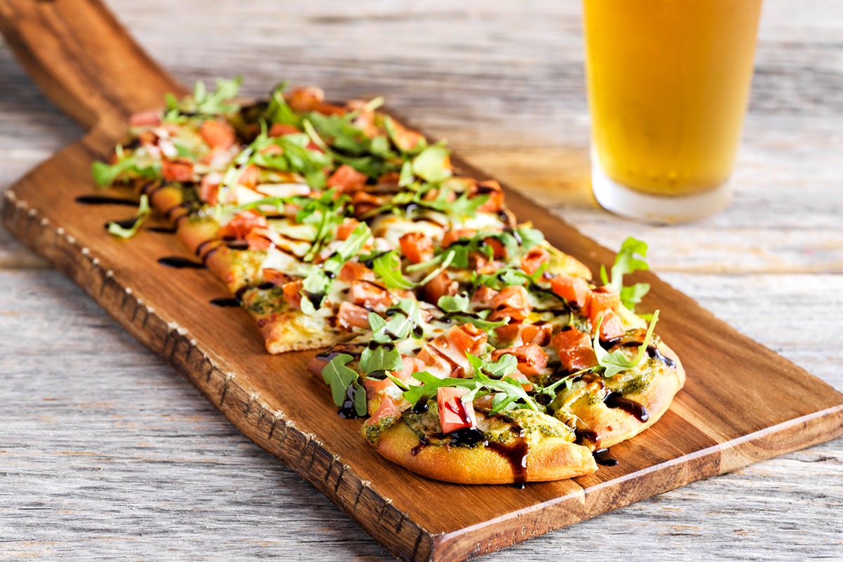 Order  Margherita Flatbread food online from World Of Beer store, Richmond on bringmethat.com