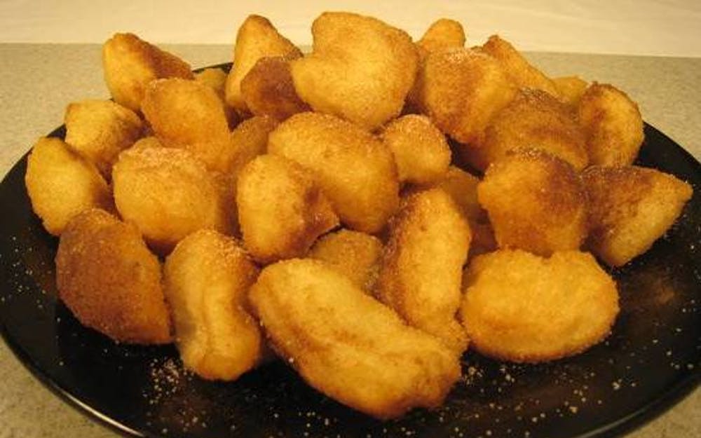 Order Fried Dough Nibbler's - Small food online from Cal'z Pizza Subs and Chicken Wings store, Virginia Beach on bringmethat.com