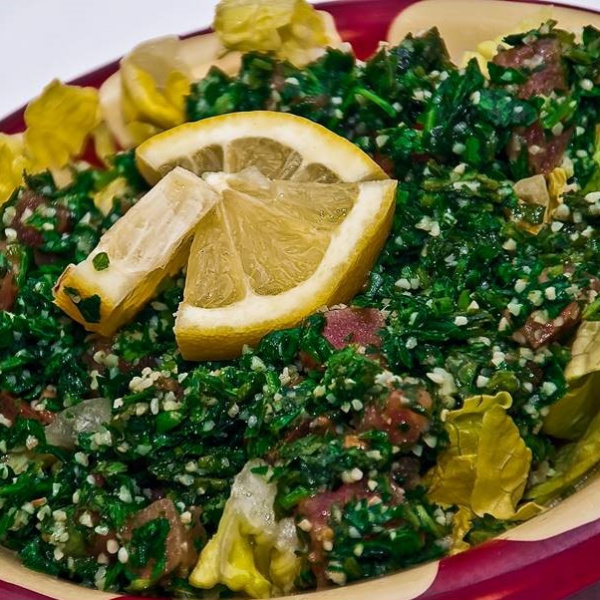 Order Tabbouleh food online from Petra Middle Eastern Cuisine store, Livermore on bringmethat.com