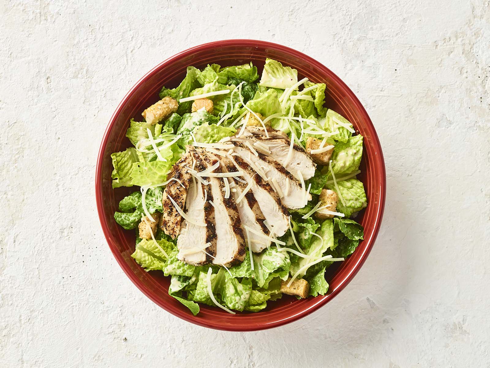 Order Caesar Salad with Chicken food online from Carrabba's Italian Grill store, Scottsdale on bringmethat.com