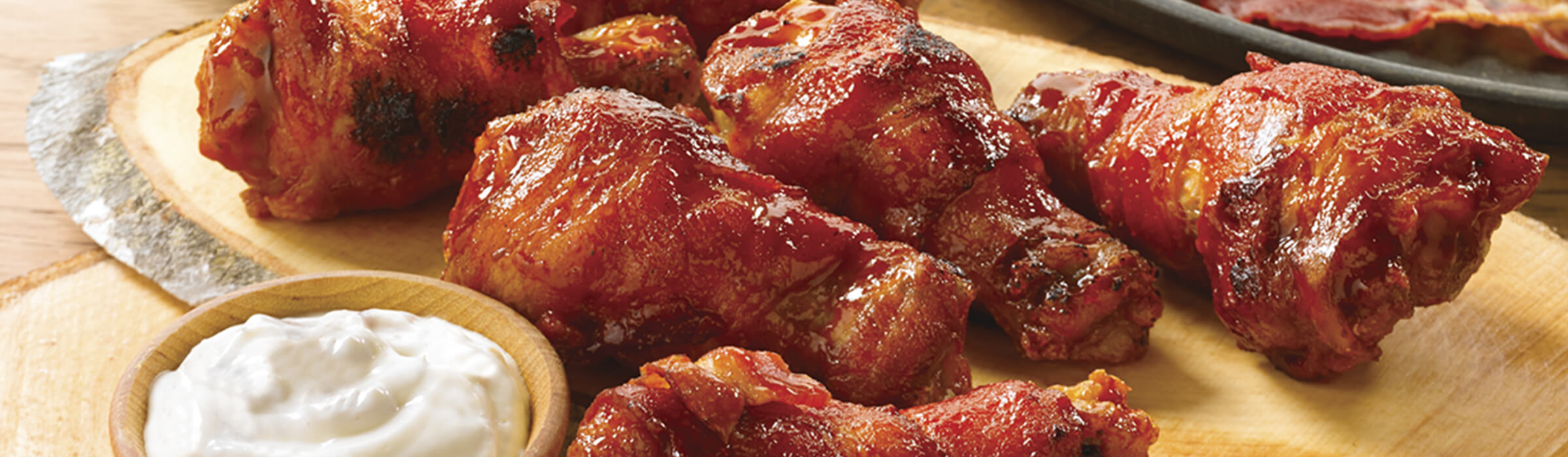 Order Hooters Bacon Wrapped Wings food online from Charlie Best Bread store, San Diego on bringmethat.com