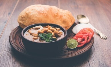Order Chole Bhatura (1 pcs) food online from Peacock Indian Cuisine store, Plano on bringmethat.com