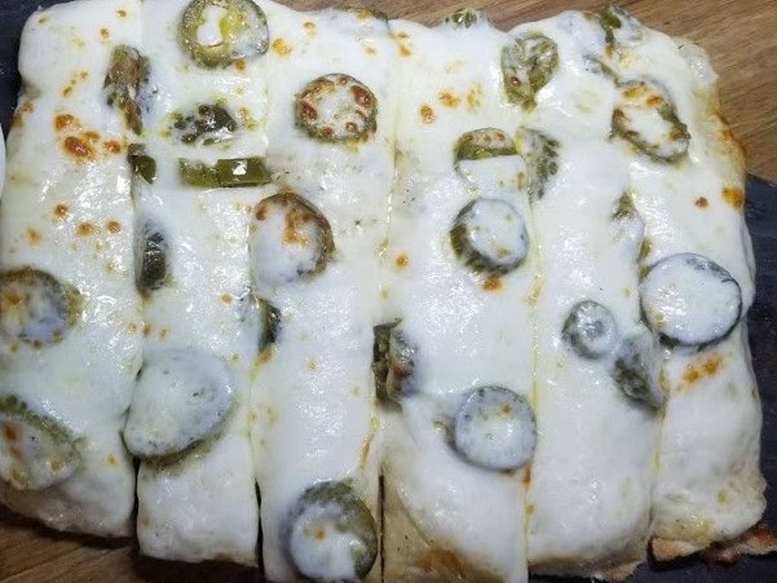Order Jalapeno Cheese Bread food online from Clockwork Pizza store, Tempe on bringmethat.com