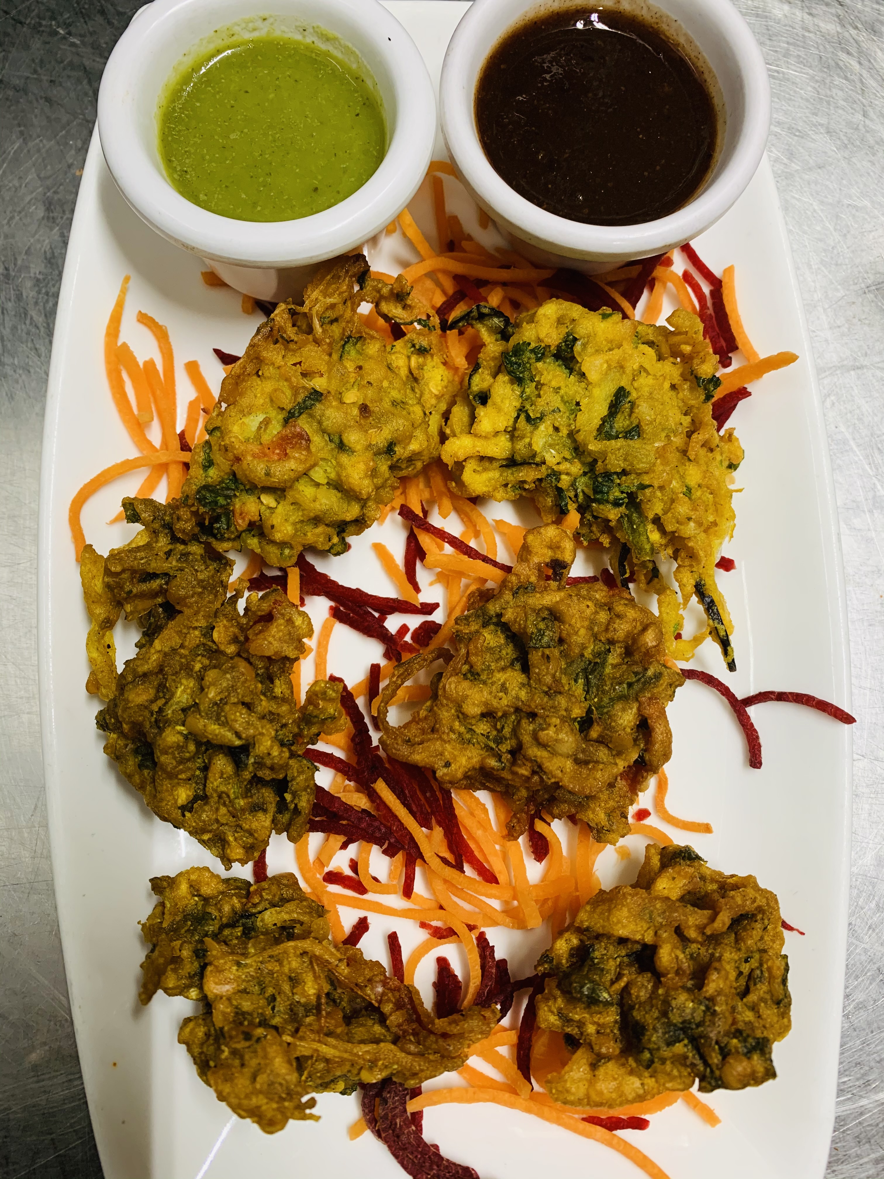 Order Onion bhajia's food online from Aahar Indian Cuisine store, New York on bringmethat.com