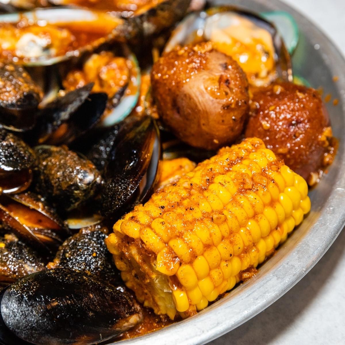 Order Black Mussels food online from Storming Crab store, Albuquerque on bringmethat.com
