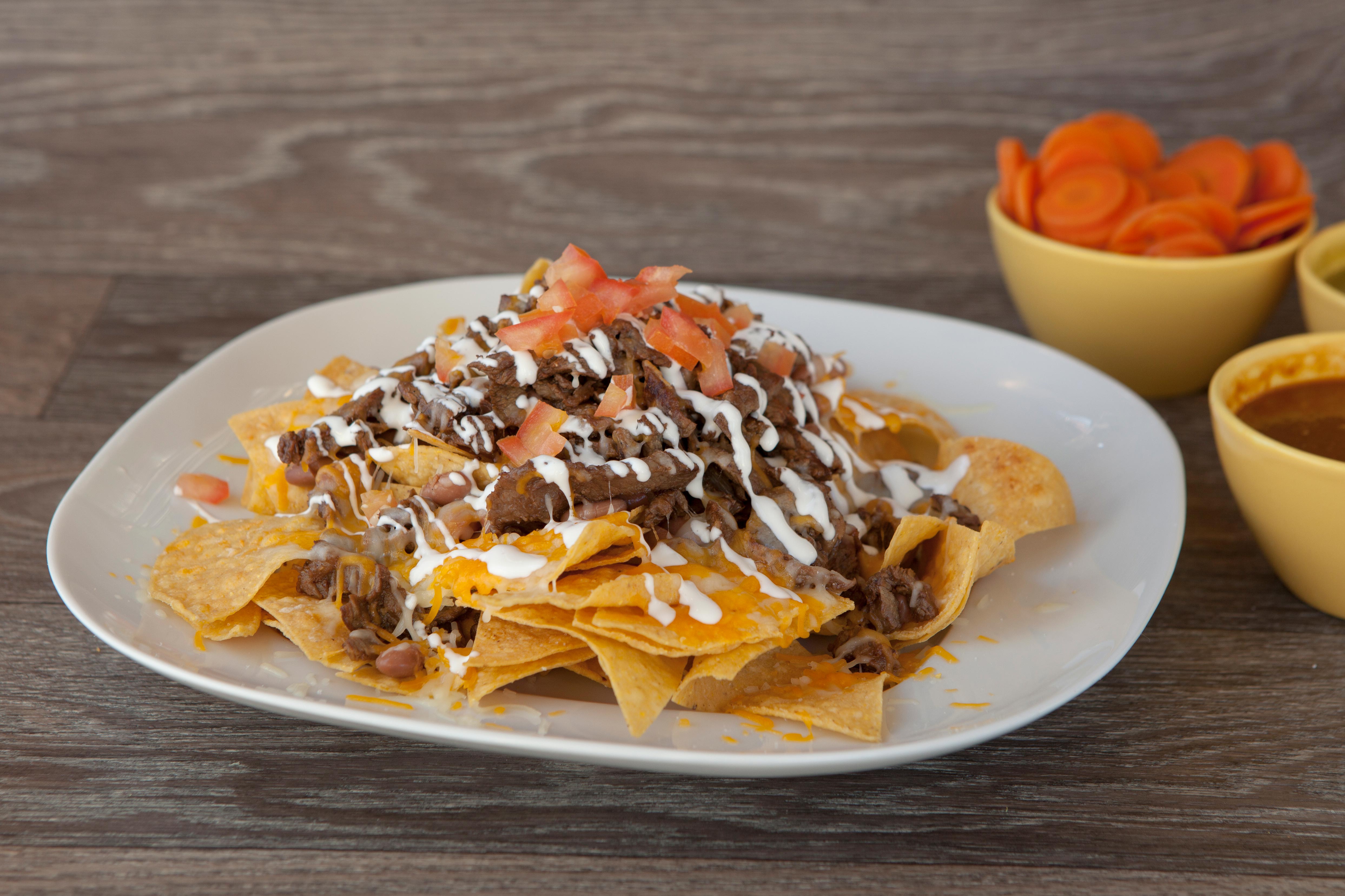 Order Nachos with Meat food online from Tacos El Unico store, Compton on bringmethat.com