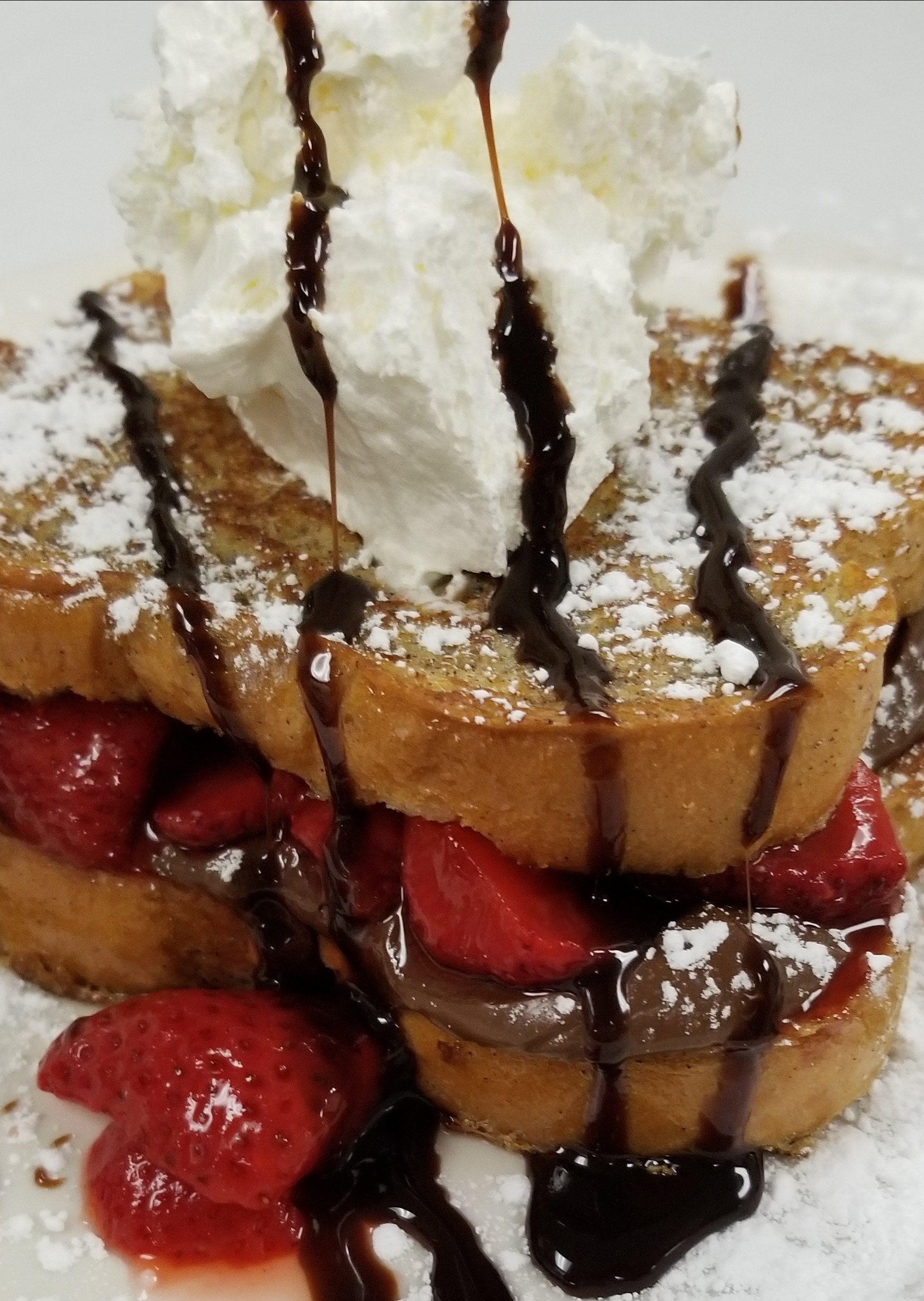 Order Strawberry Nutella Stuffed French Toast food online from Kelley Deli store, Westerly on bringmethat.com