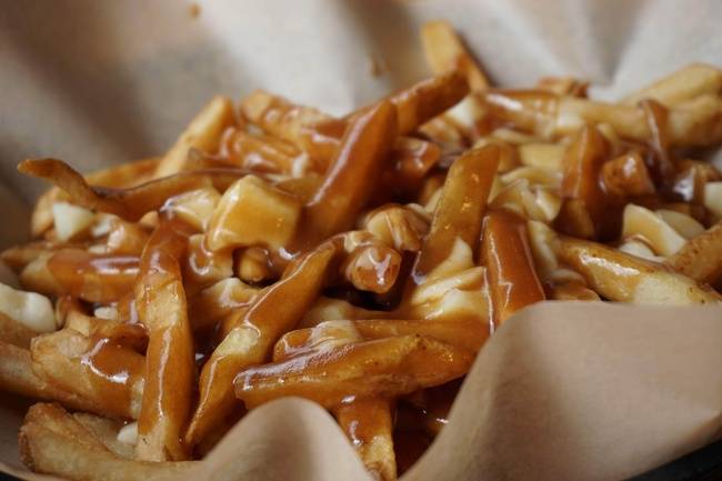 Order Montreal Poutine - Half Order food online from Jack's Grill store, Ithaca on bringmethat.com