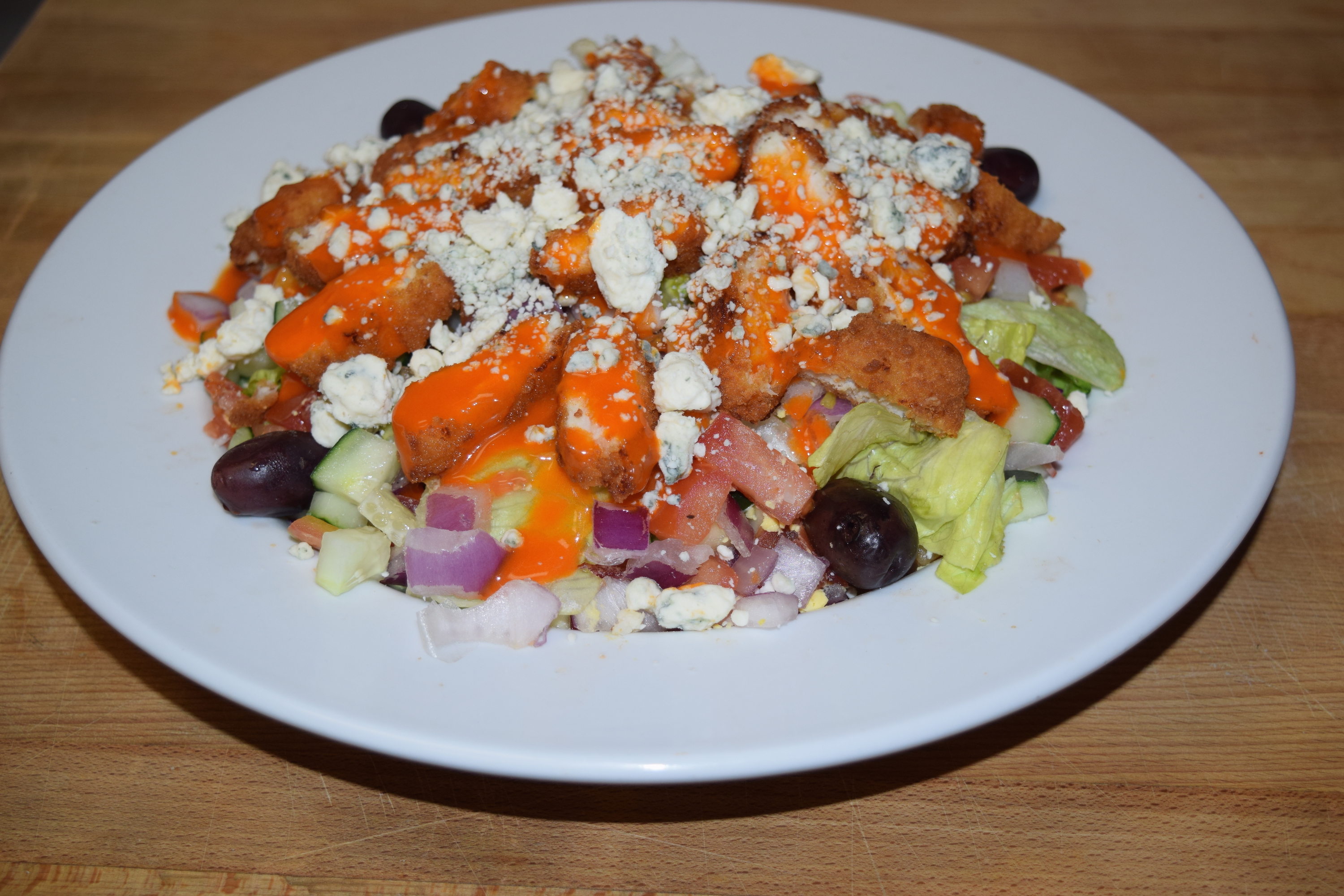 Order Buffalo Chicken Salad food online from Cuzino Pizza & Pasta store, North East on bringmethat.com