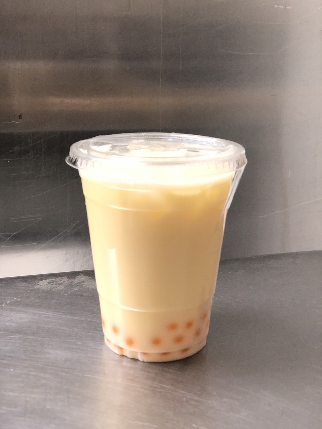 Order Iced Mango Milk  food online from Sirinan Thai&Japanese Restaurant store, Wallingford on bringmethat.com