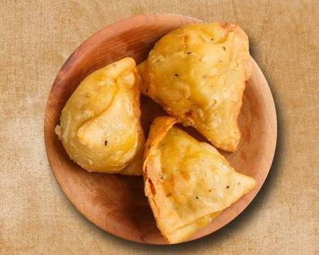 Order Downtown Samosa food online from Curry Consortium store, Topeka on bringmethat.com