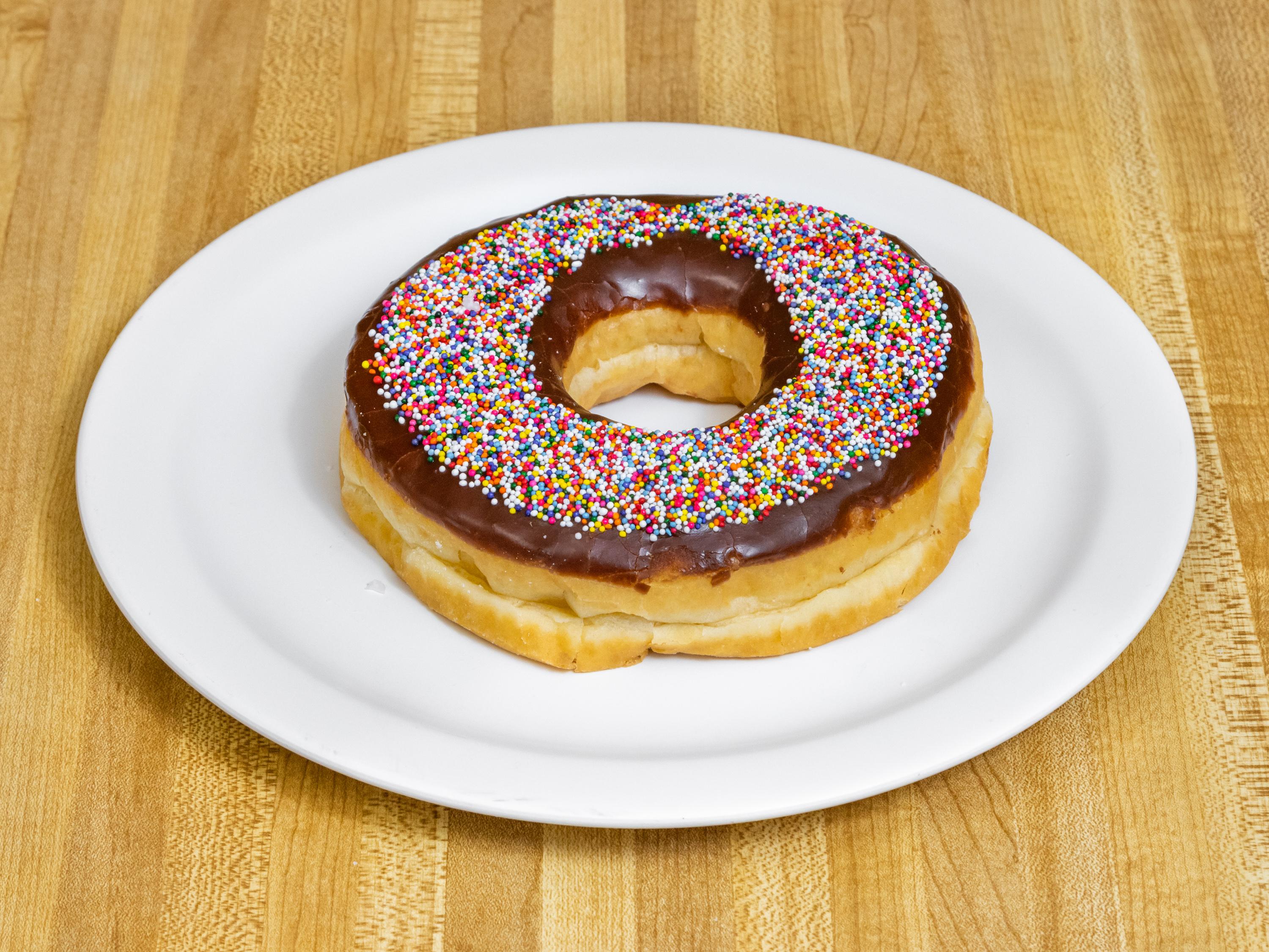 Order Texas size Sprinkle Donut food online from Donut Palace store, Garland on bringmethat.com