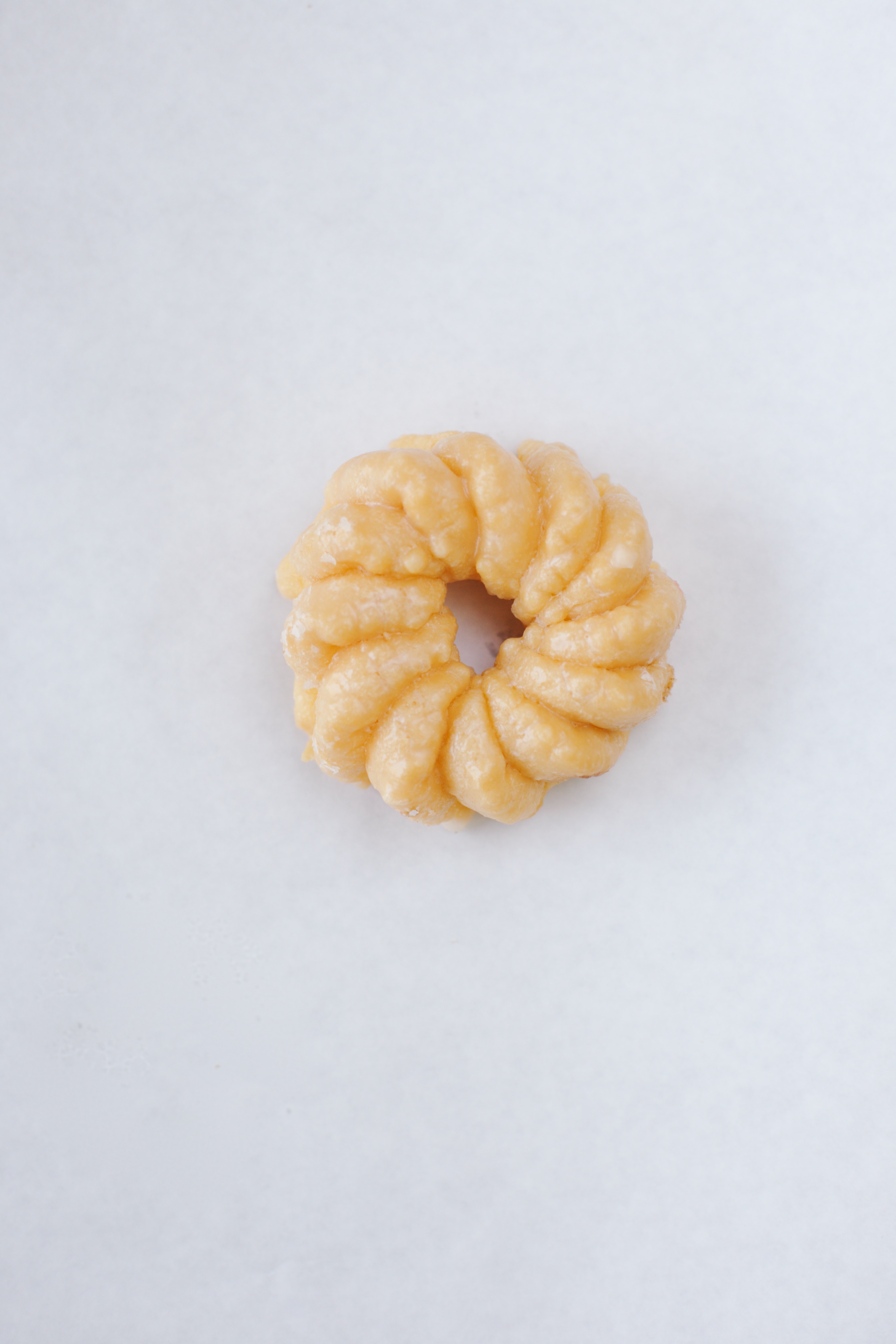 Order French Cruller Glaze food online from Smile Donut House store, Los Angeles on bringmethat.com