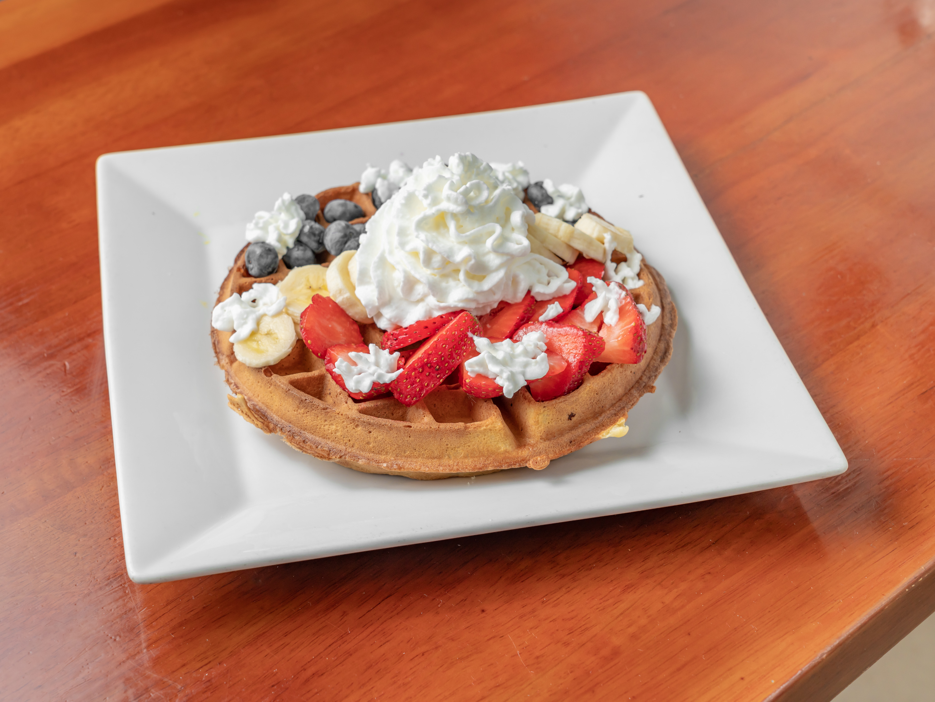 Order Waffle with Fruit food online from Rochelle Coffee Shop store, Wykagyl on bringmethat.com