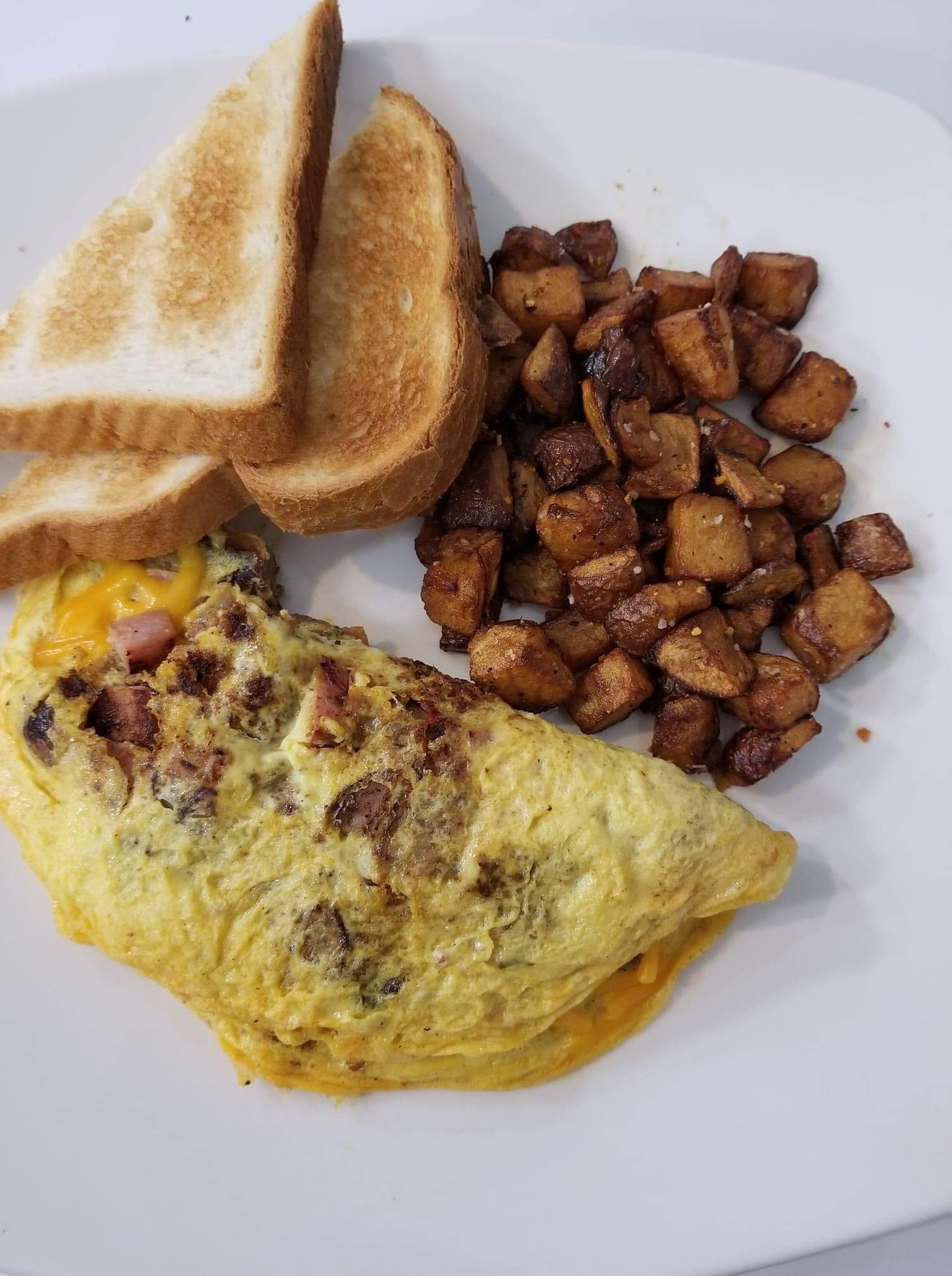 Order MEAT LOVER OMELETTE food online from Thiago's Restaurant store, Chicago on bringmethat.com
