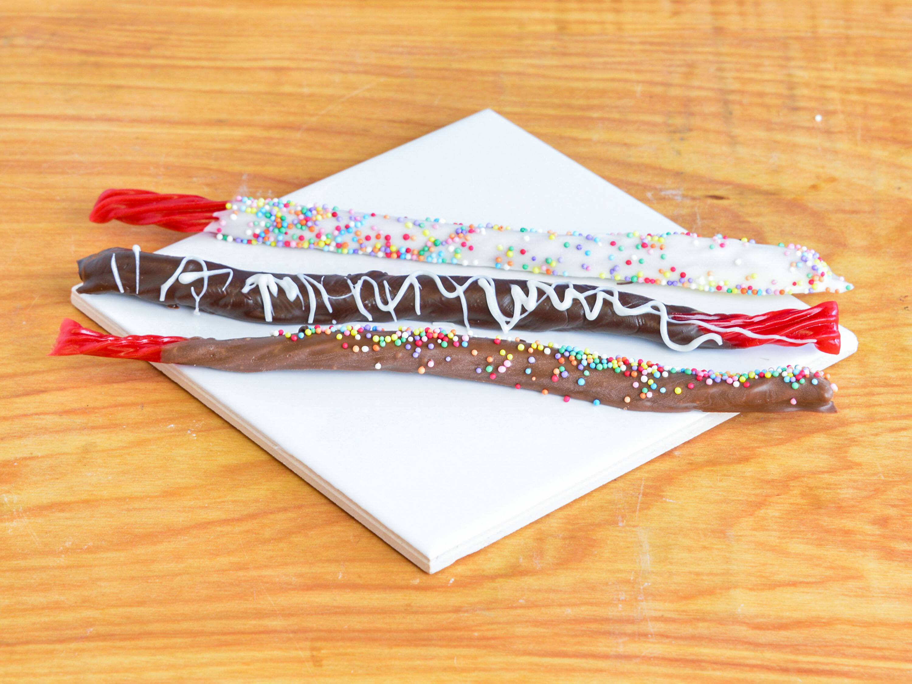 Order Chocolate Dipped Twizzlers food online from Chocolate Moose store, Pittsburgh on bringmethat.com