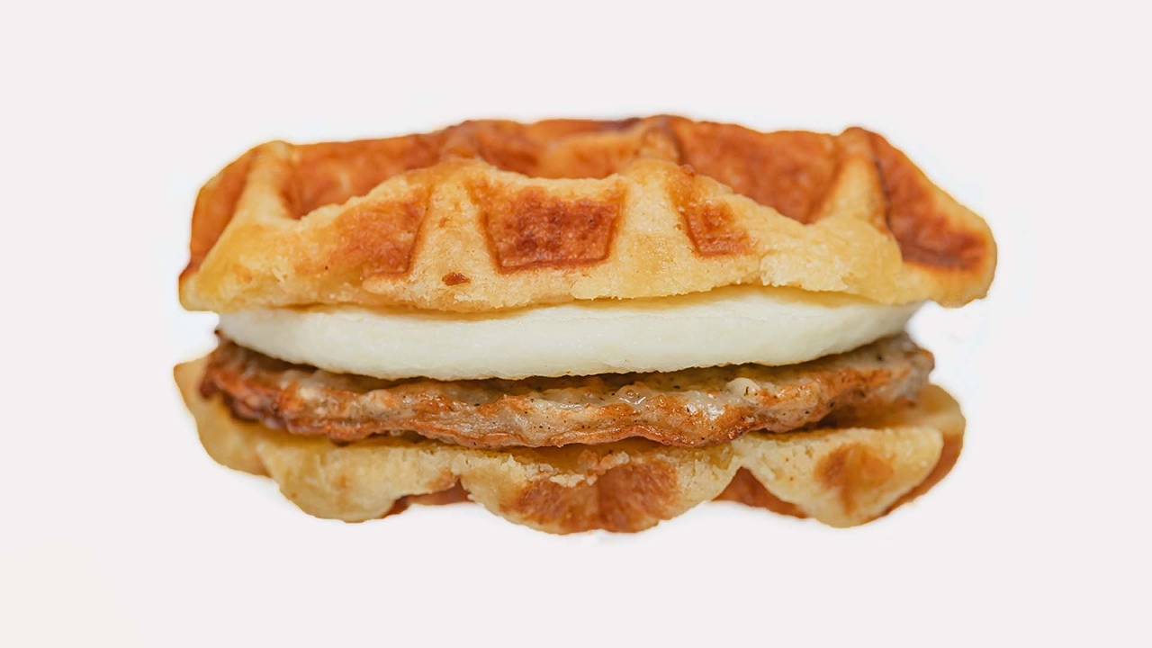 Order Sausage, Egg & Waffle Sandwich food online from The Human Bean store, West Columbia on bringmethat.com