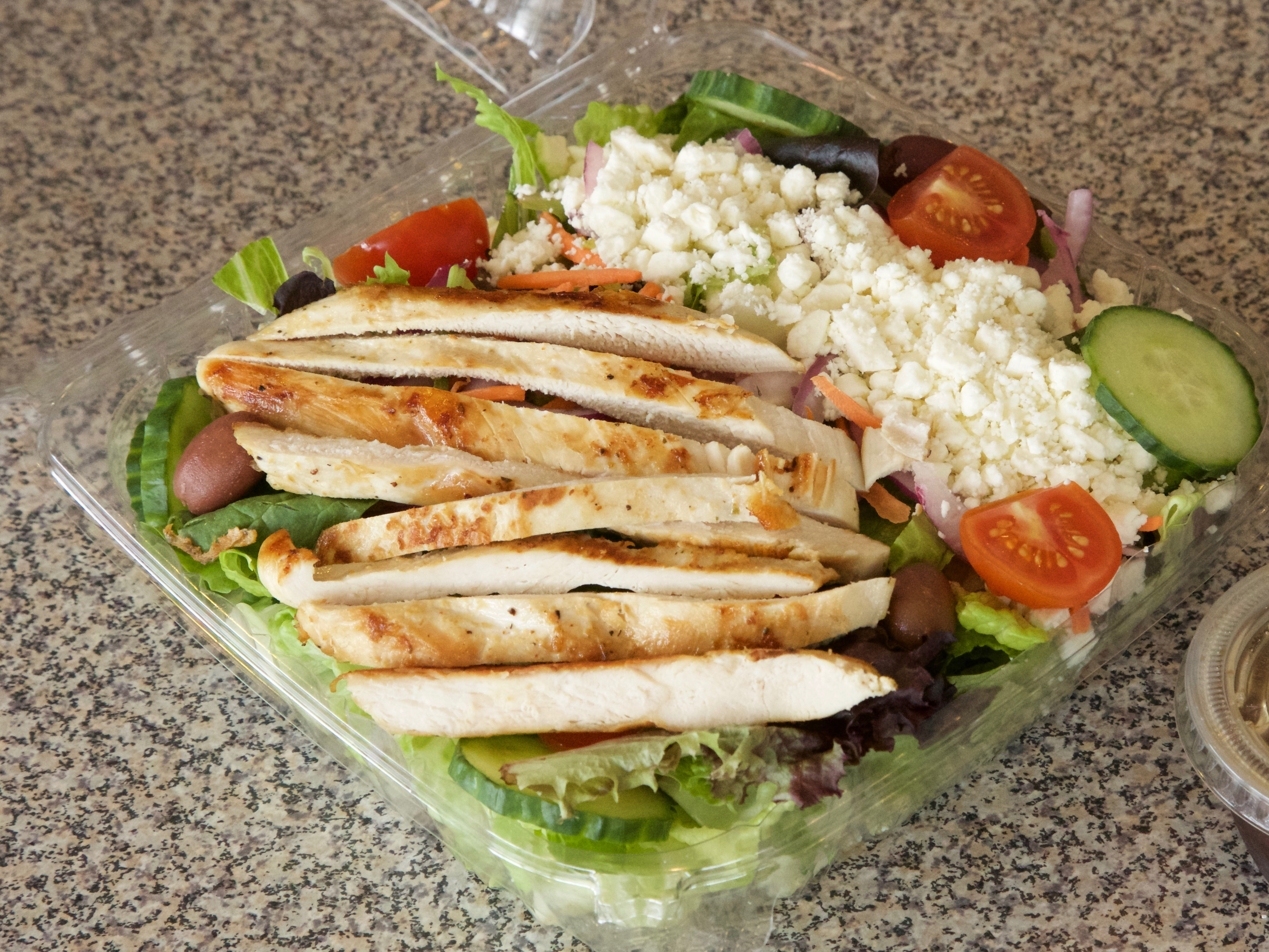 Order Greek Salad food online from New York Deli & Pizza store, Waltham on bringmethat.com