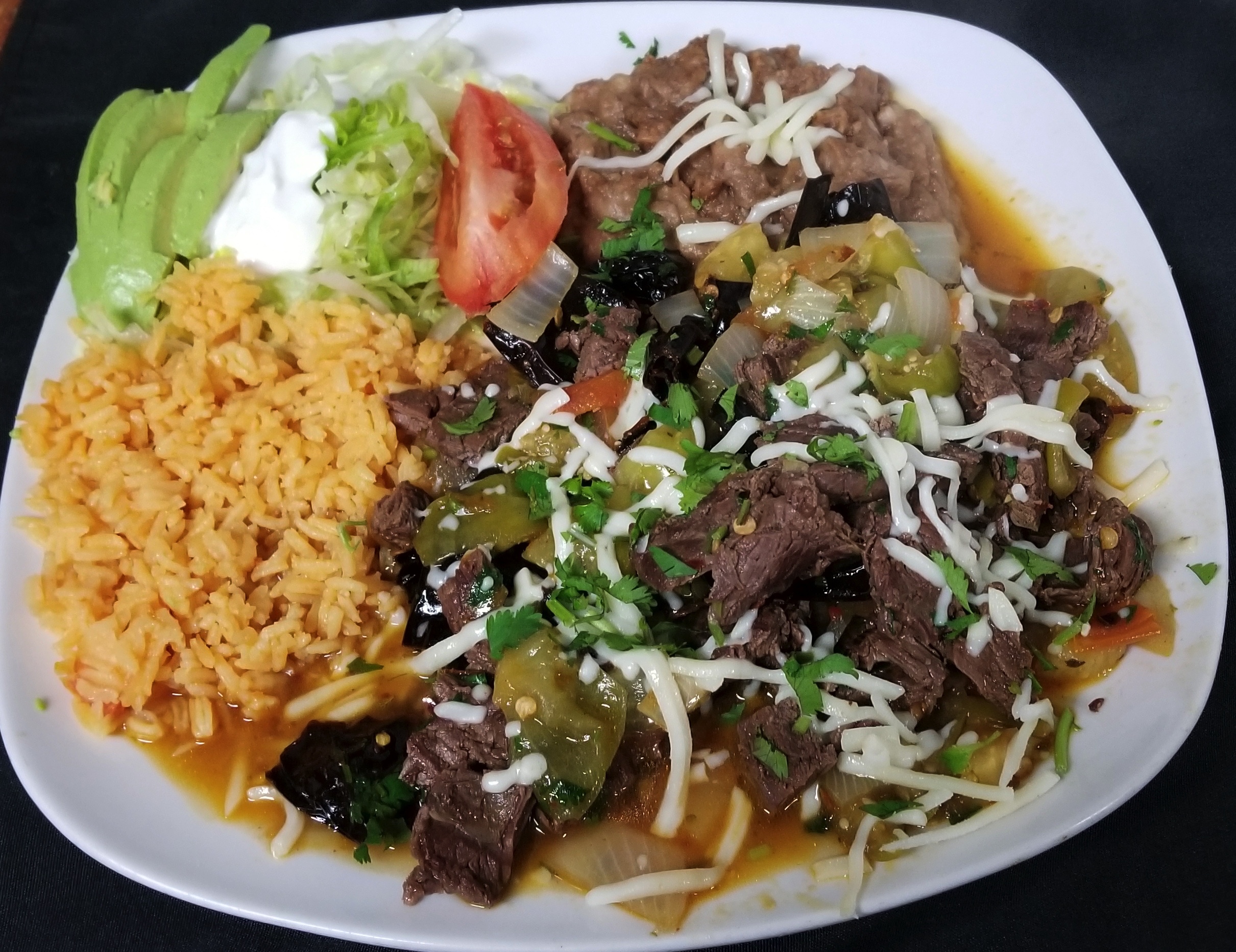 Order Bistec a la Mexicana food online from Martinez Tacos Restaurant store, Kankakee on bringmethat.com