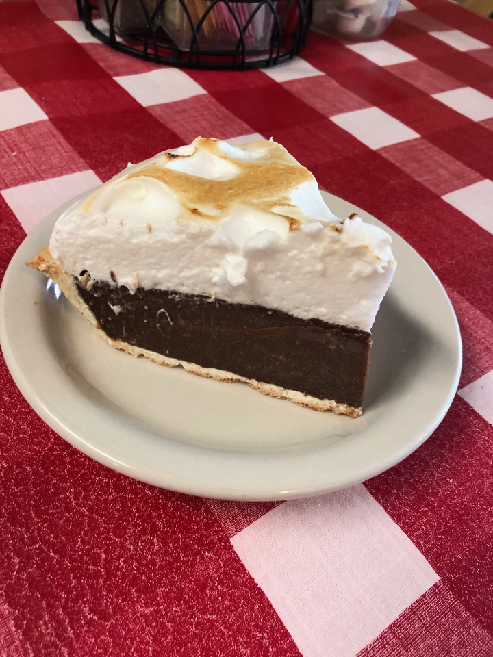 Order Chocolate Merigue Pie food online from The Texan Cafe & Pie Shop store, Hutto on bringmethat.com