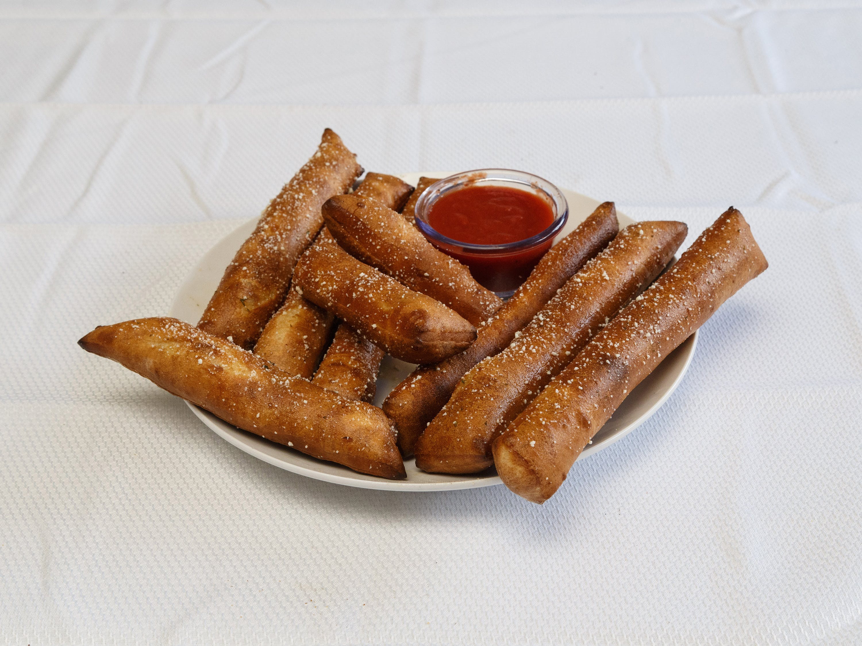 Order Garlic Parmesan Breadsticks - 8 Pieces food online from Pizza Pronto store, Pittsburgh on bringmethat.com