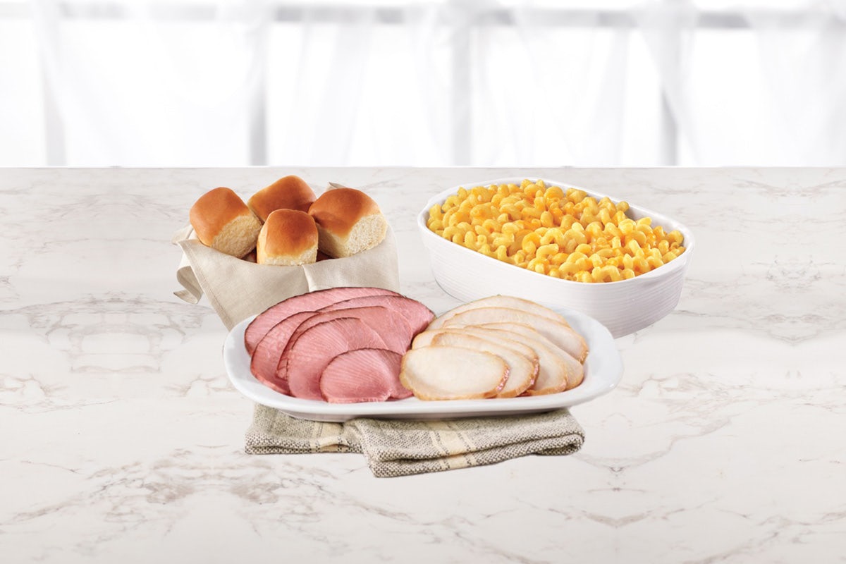 Order 1lb Smoked Turkey Slices Dinner food online from Honeybaked Ham Company and Cafe store, Stockbridge on bringmethat.com