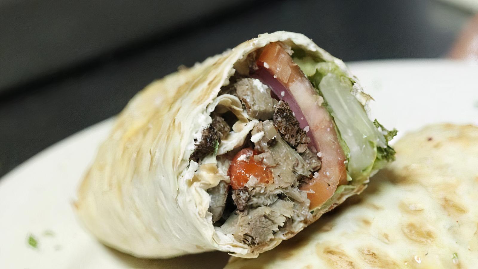 Order Chicken Caesar Wrap food online from Angelico Pizzeria and Cafe store, Washington on bringmethat.com