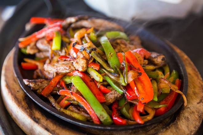 Order Sizzling Fajitas food online from Gabriele's Bar and Grill store, Piscataway Township on bringmethat.com