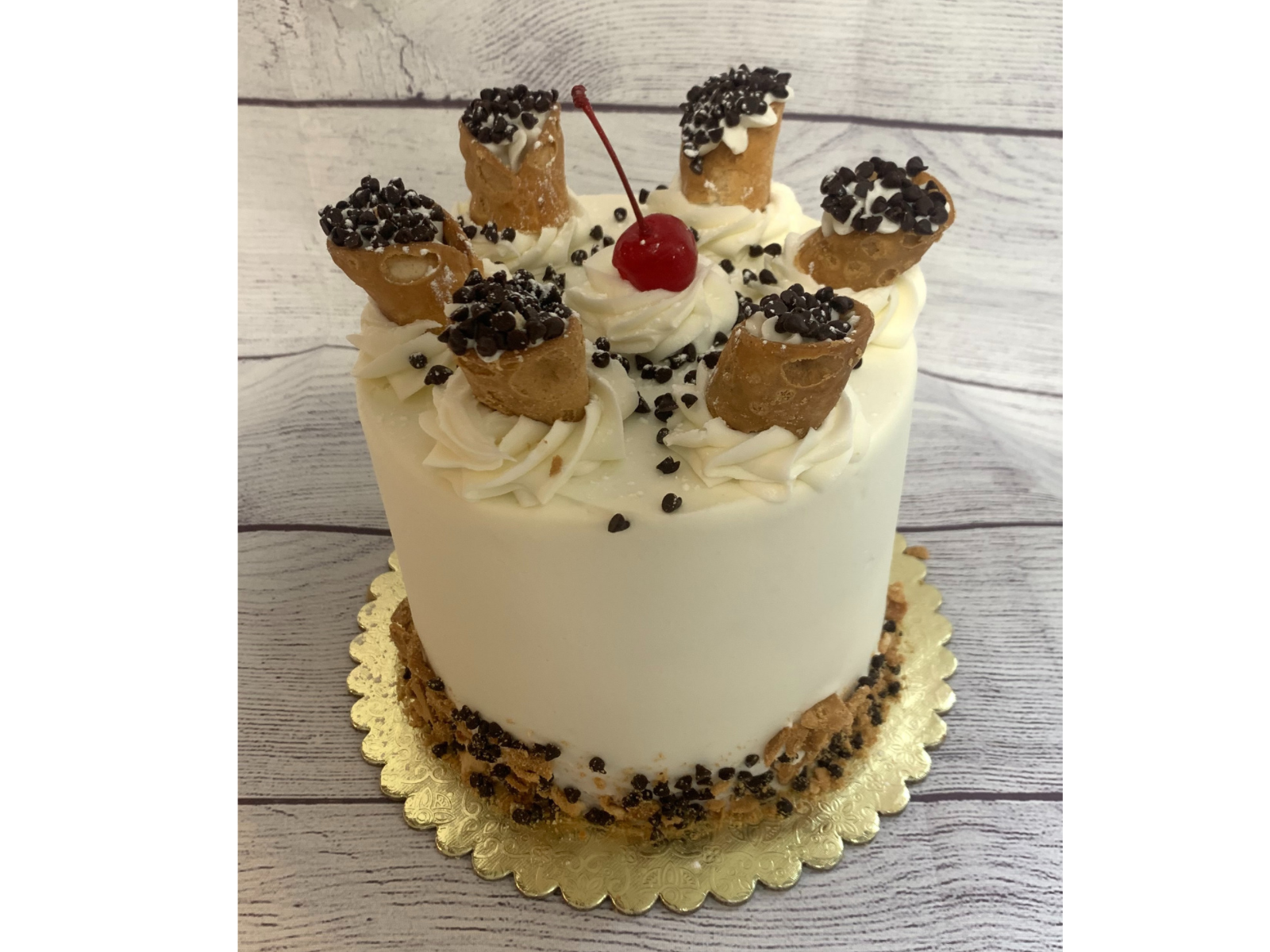 Order Cannoli Cake food online from Coccadotts Cake Shop store, Albany on bringmethat.com