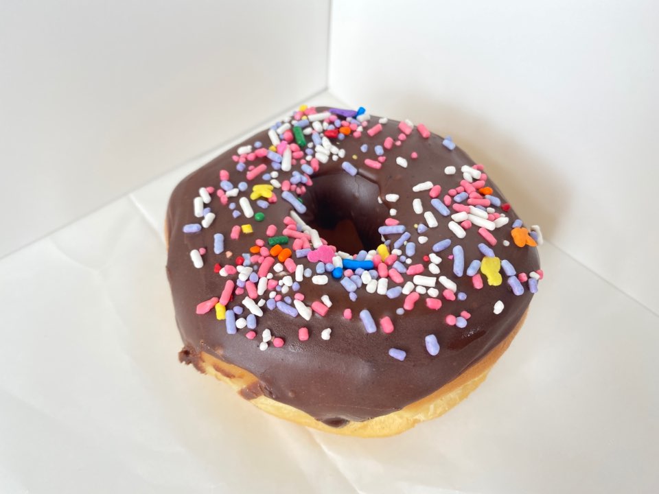 Order Sprinkle Donut food online from Grace Donuts store, Fort Worth on bringmethat.com