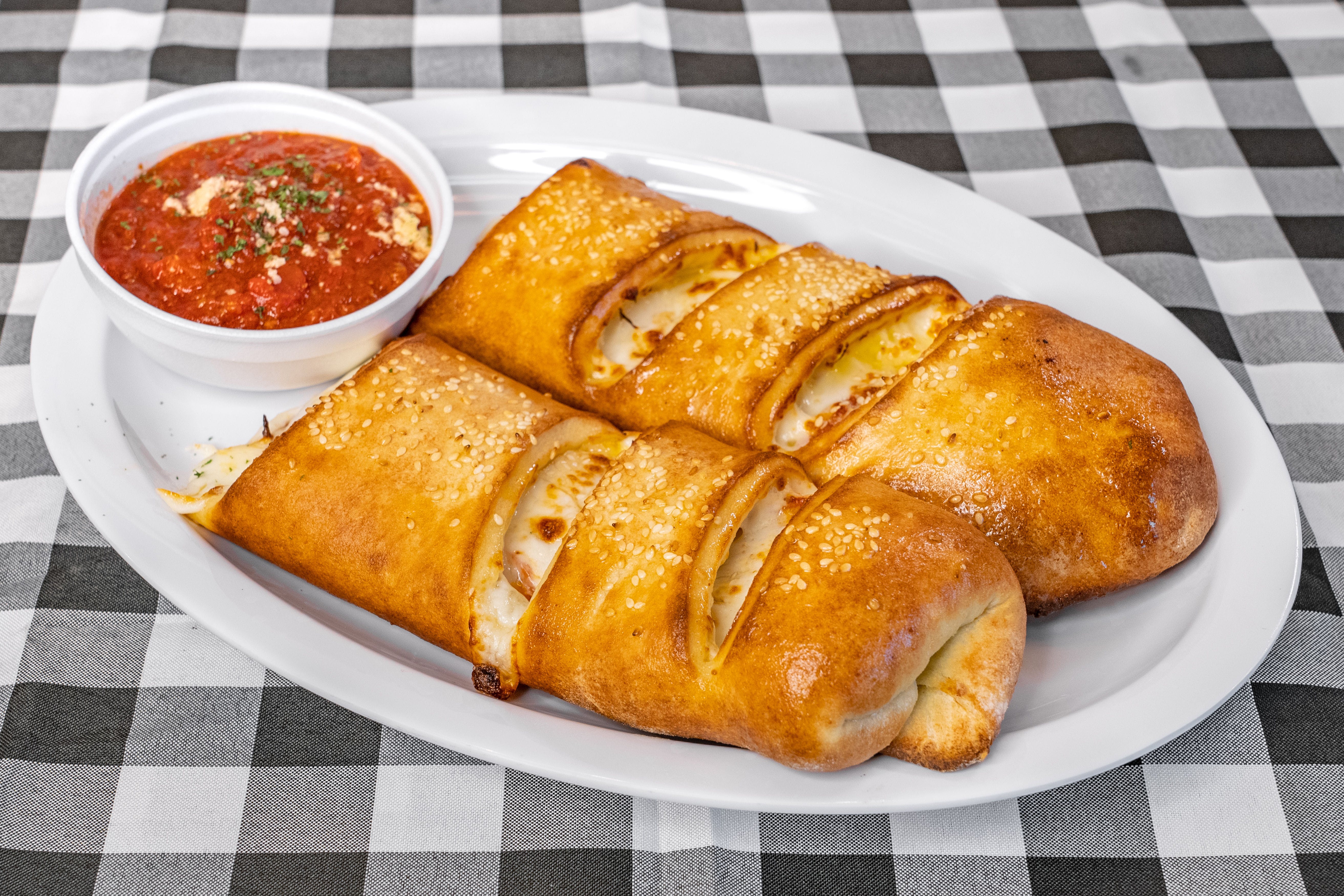 Order Pepperoni Roll - Rolls food online from Bella's Pizzeria store, Moore on bringmethat.com