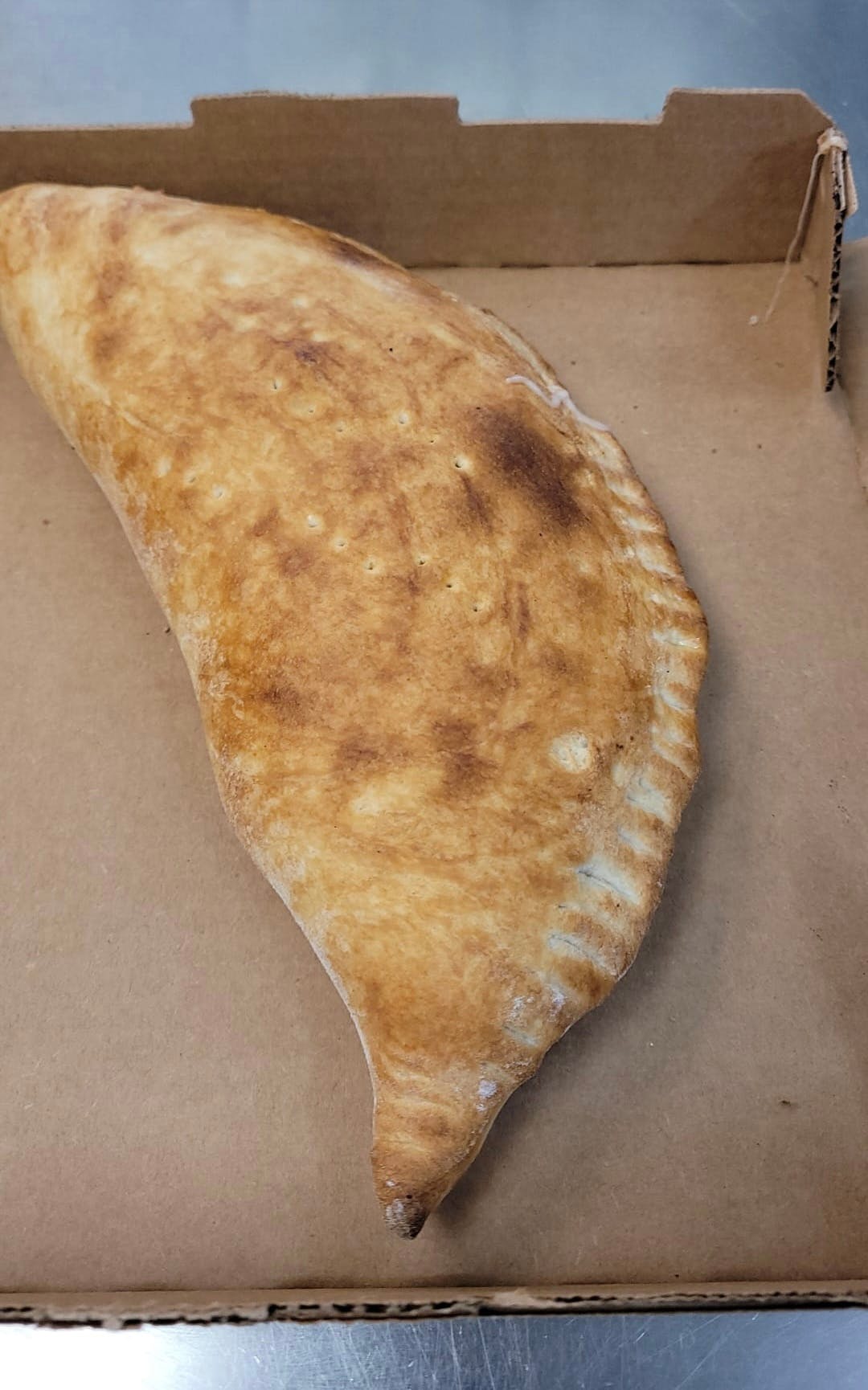 Order Plain Calzone - Calzone food online from Leandro Pizza House store, Philadelphia on bringmethat.com