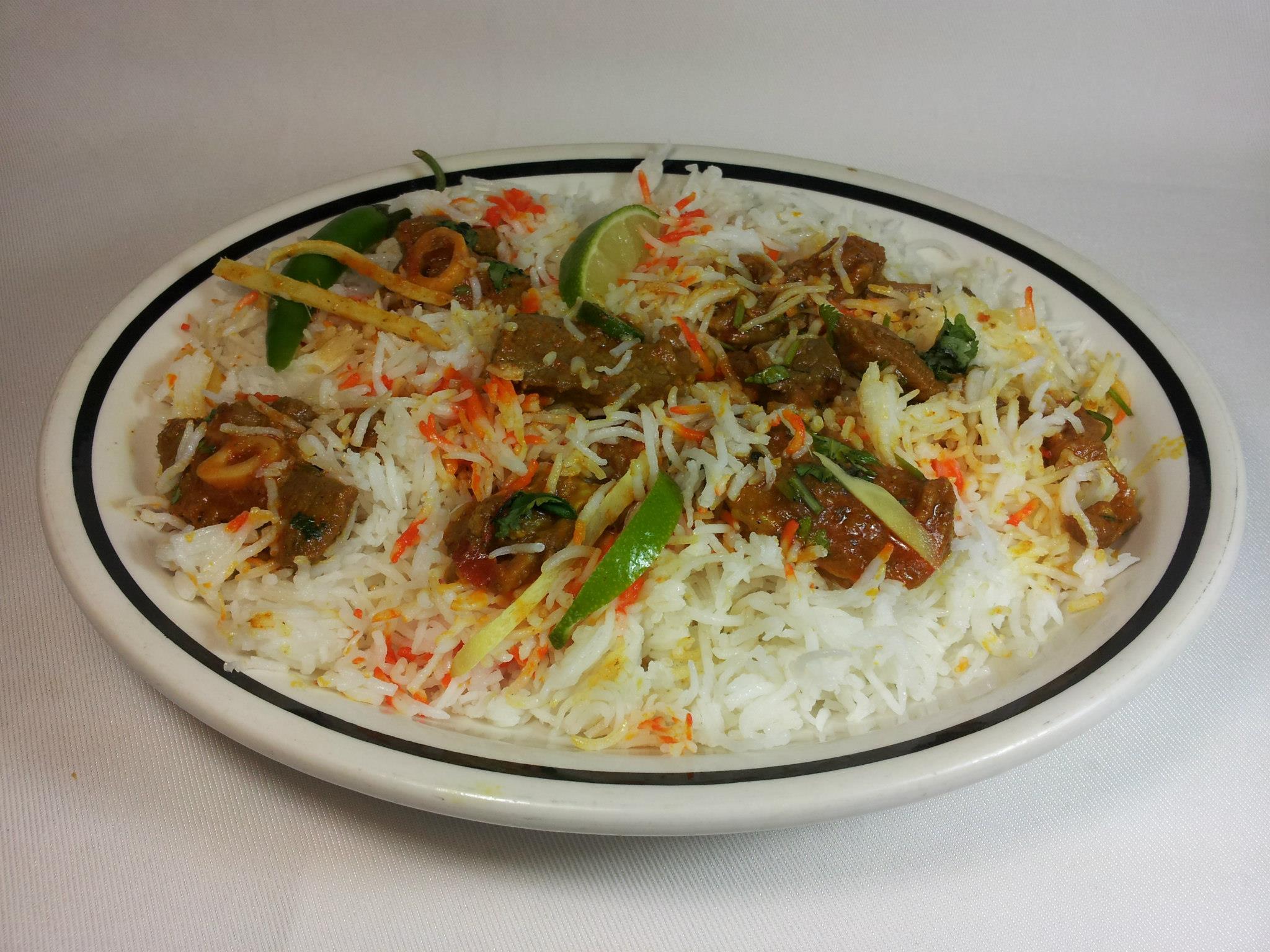 Order 9. Goat Biryani food online from Lahore Food store, Chicago on bringmethat.com