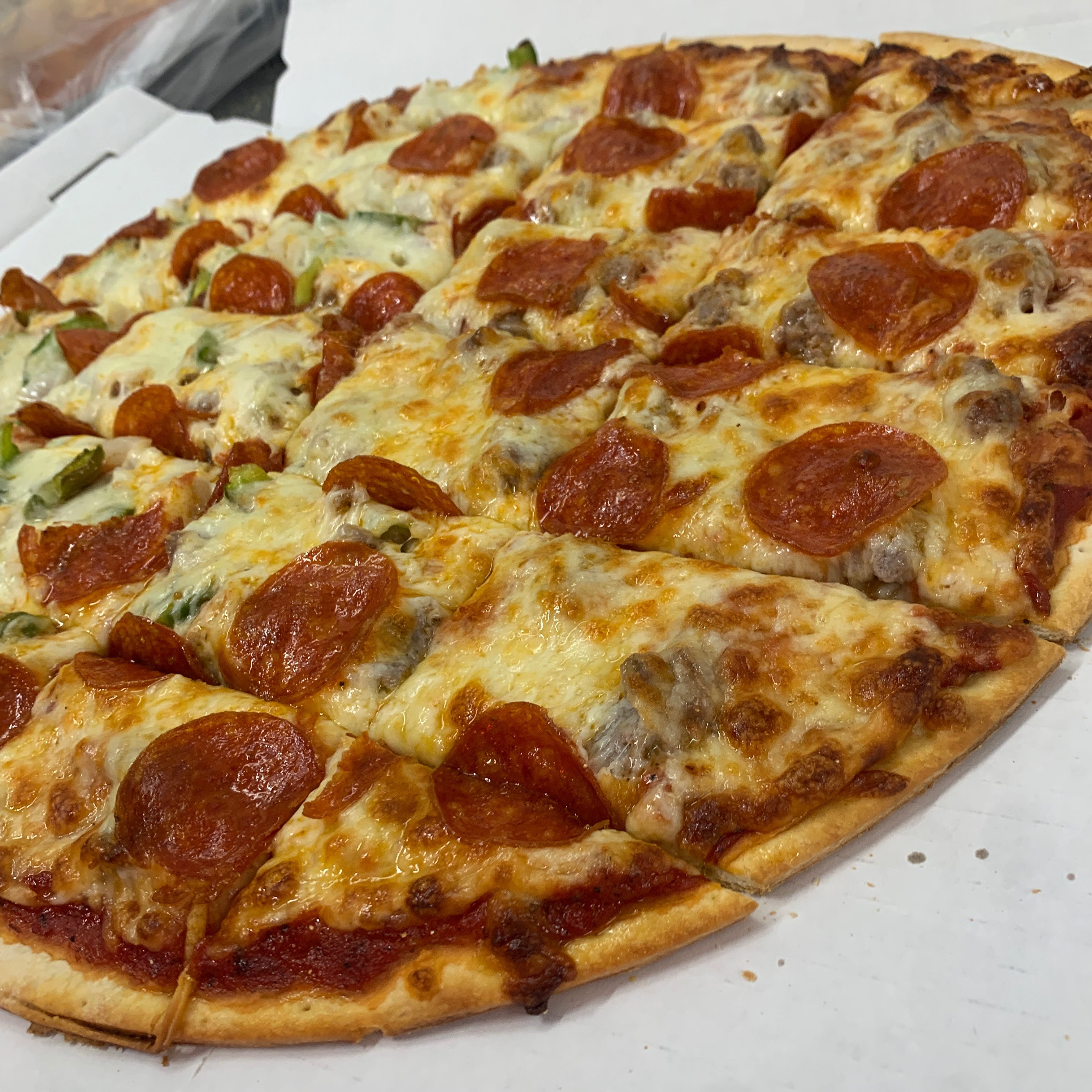 Order Thin Crust Cheese Pizza - Small 12'' food online from Mario's Pizza store, Northbrook on bringmethat.com