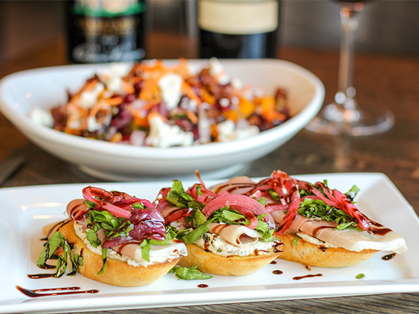 Order Prosciutto Bruschetta food online from Reds At Thousand Oaks store, Grand Rapids on bringmethat.com