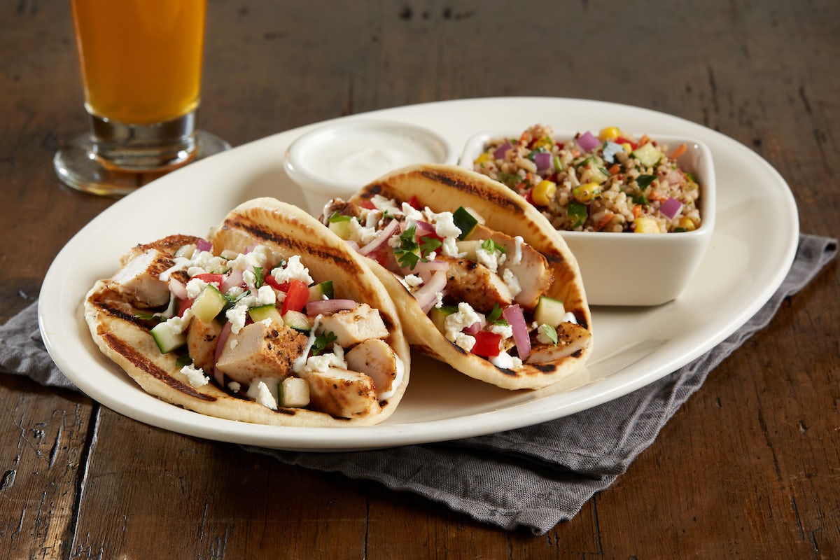 Order Enlightened Mediterranean Chicken Pita Tacos food online from BJ Brewhouse store, Stockton on bringmethat.com