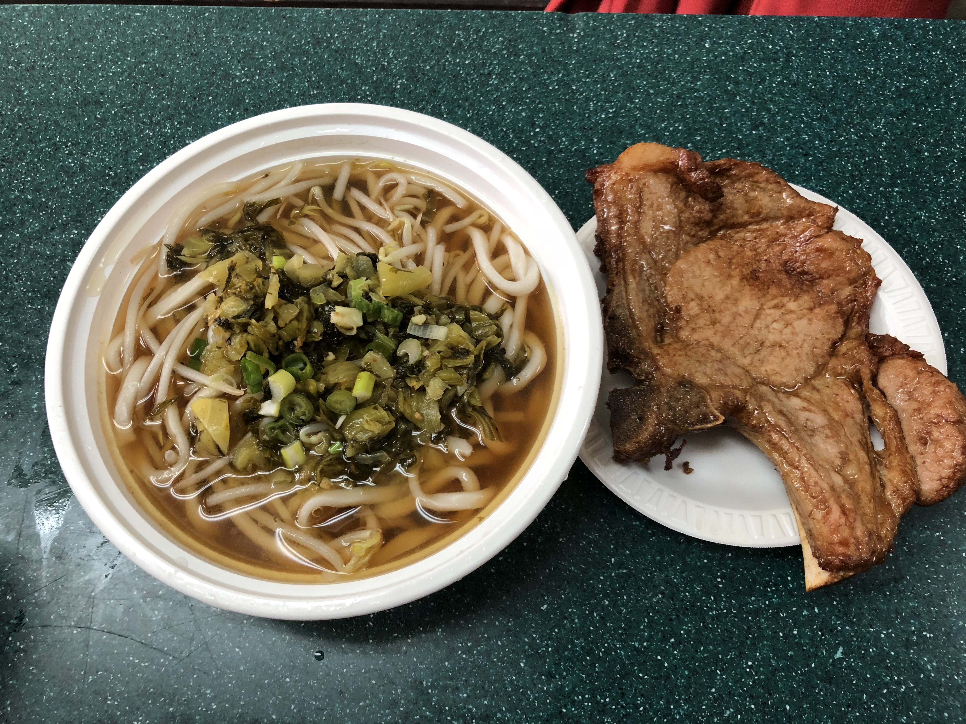 Order 23. Pork Chop Noodle with Soup 扒骨汤面 food online from May Wah Fast Food store, New York on bringmethat.com