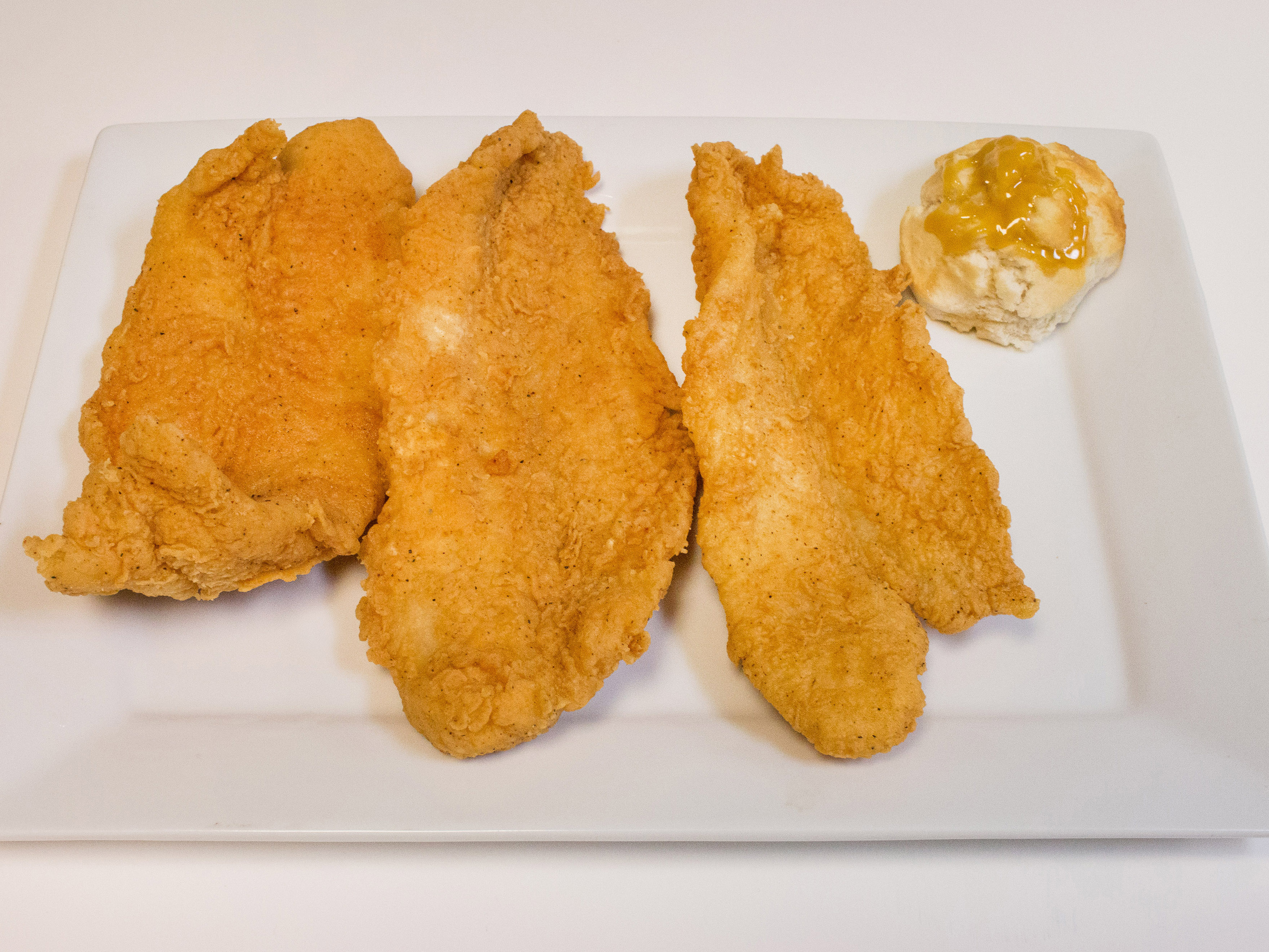 Order 1 Piece Catfish food online from Ultimate Pizza store, Howell on bringmethat.com
